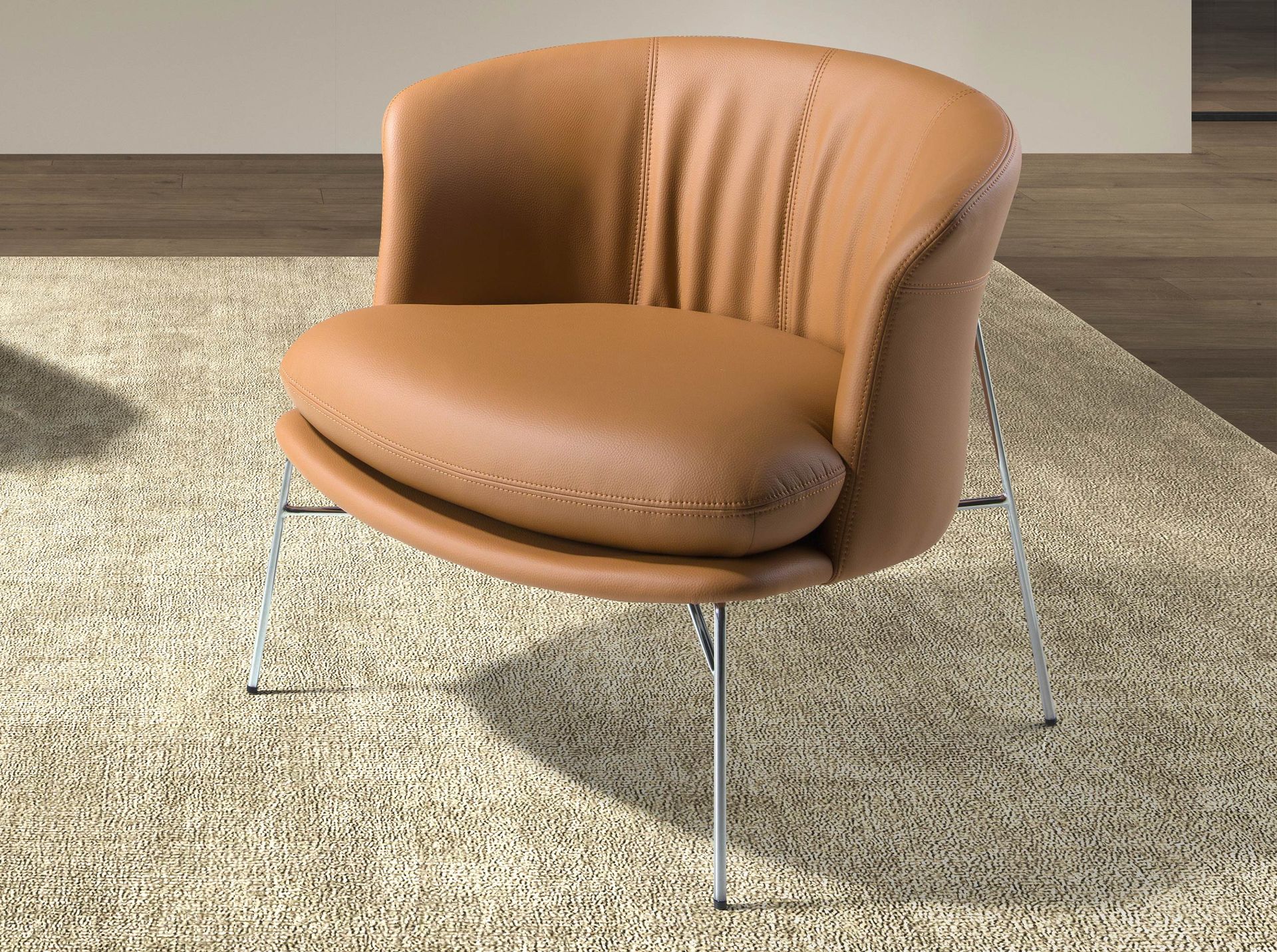 Armchair upholstered in brown leatherette