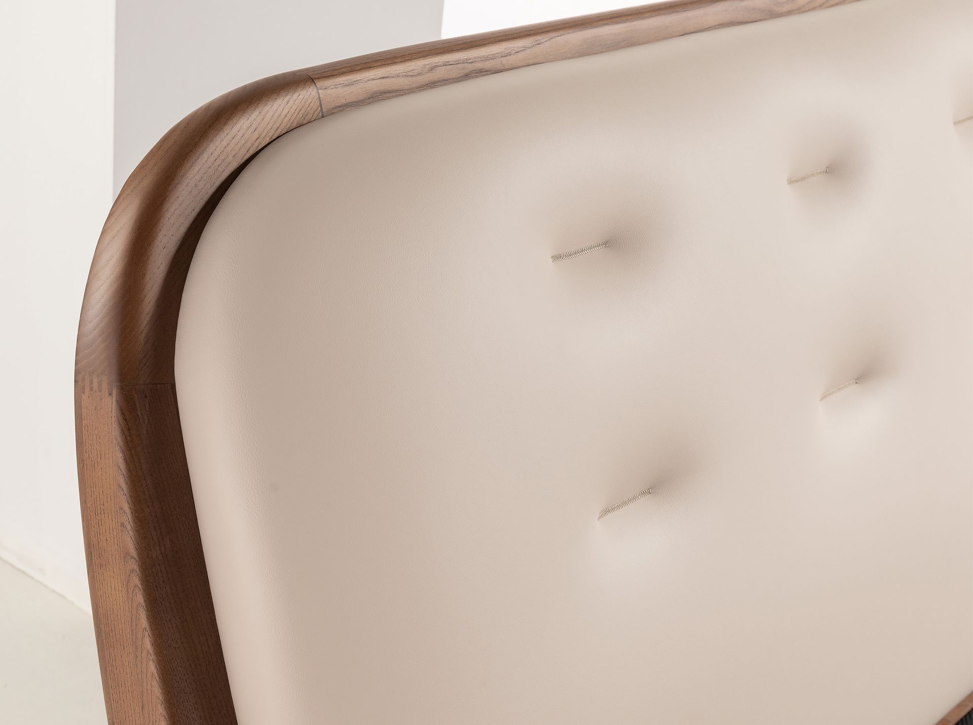 Bed in sand-coloured leatherette