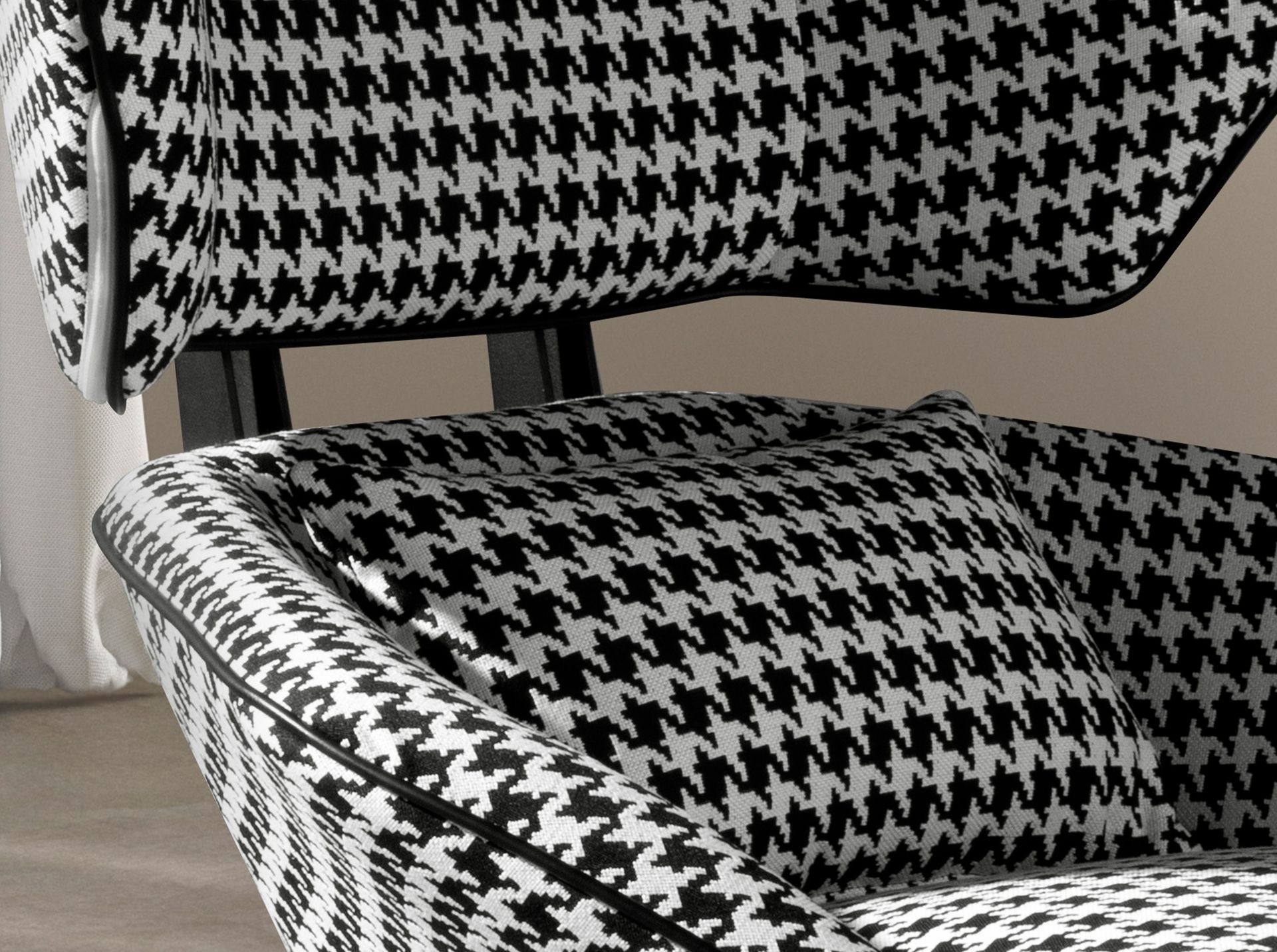 Black and white fabric swivel armchair