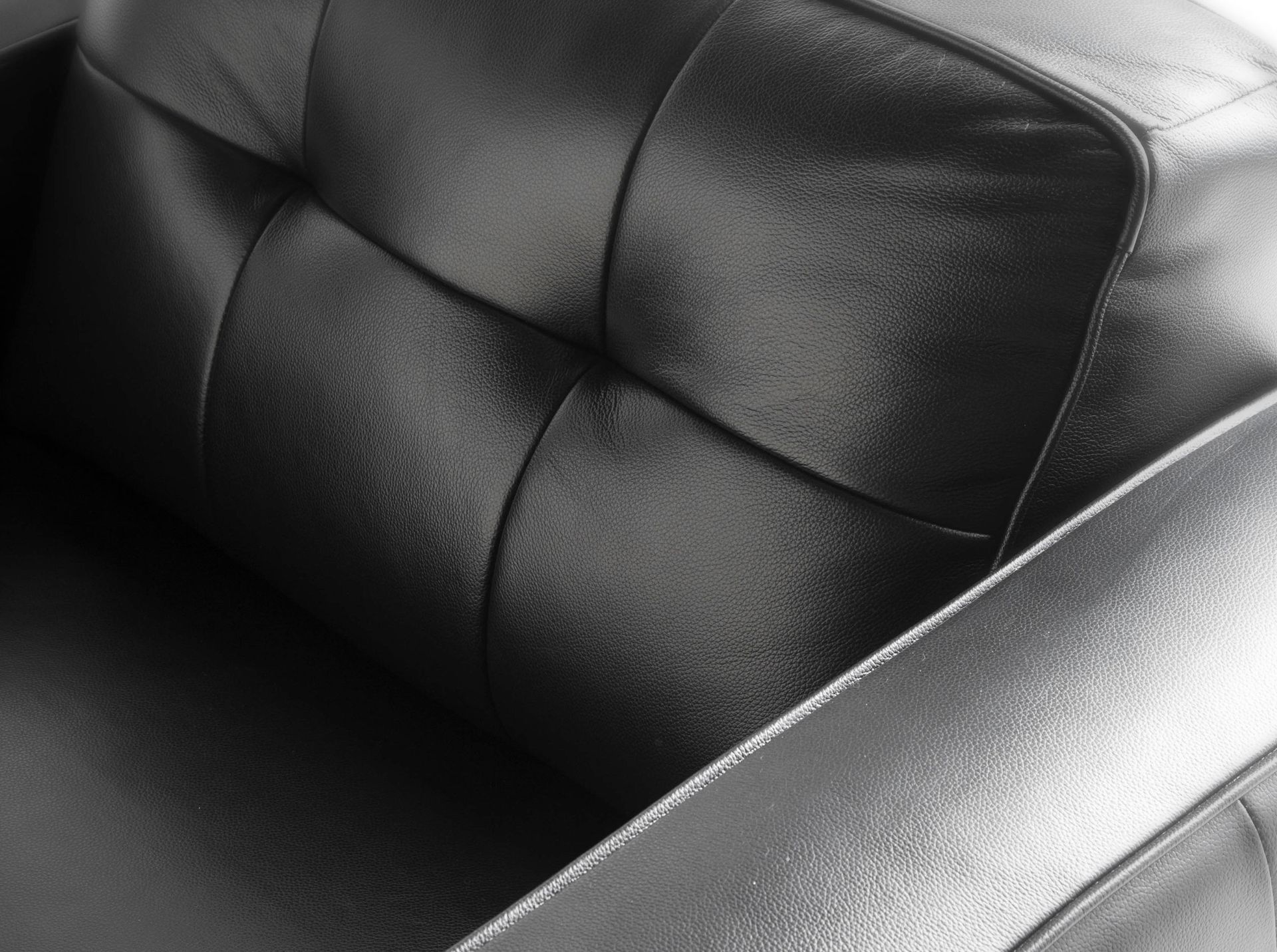 Black leather chester armchair