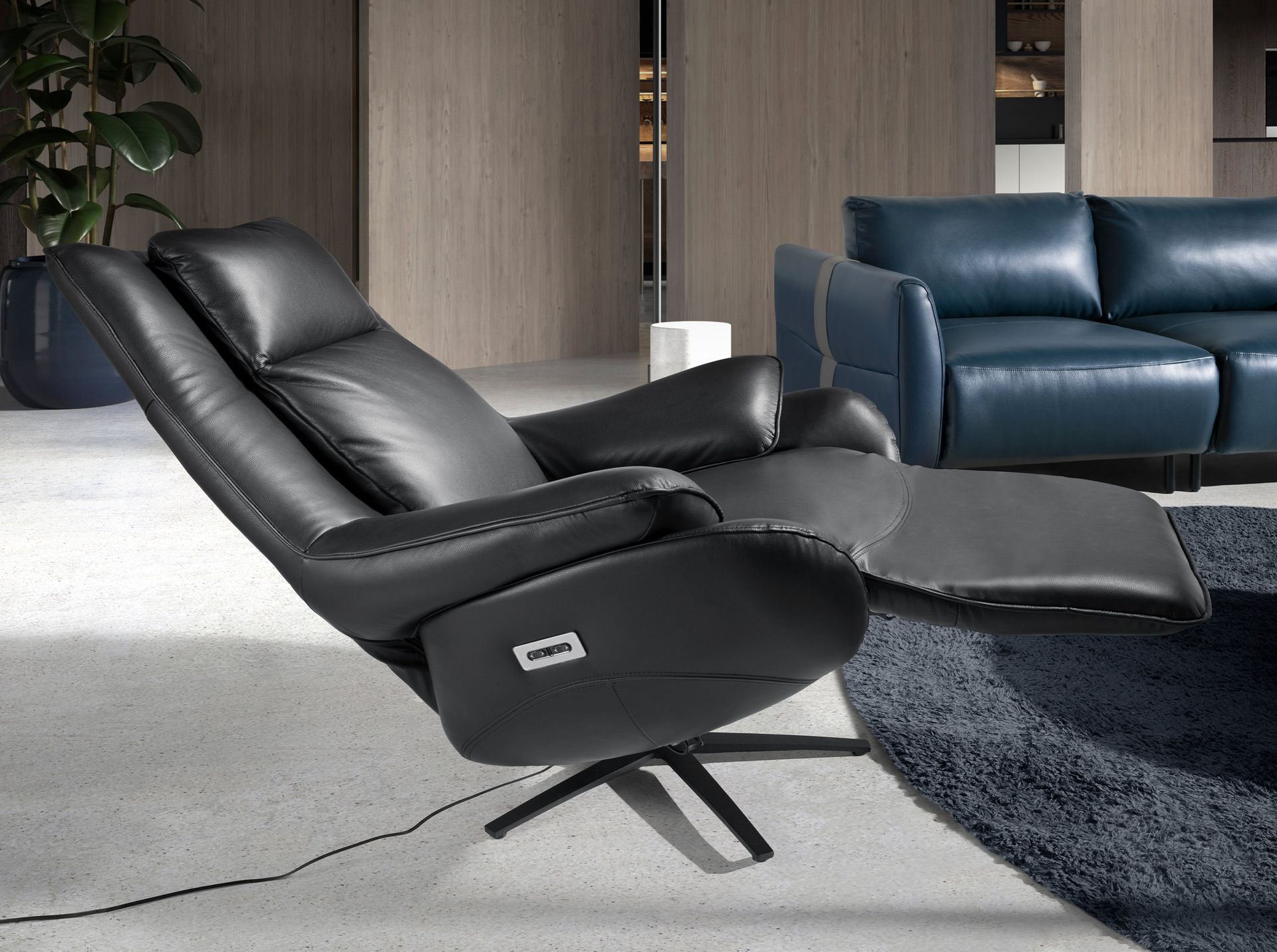 Black leather swivel armchair