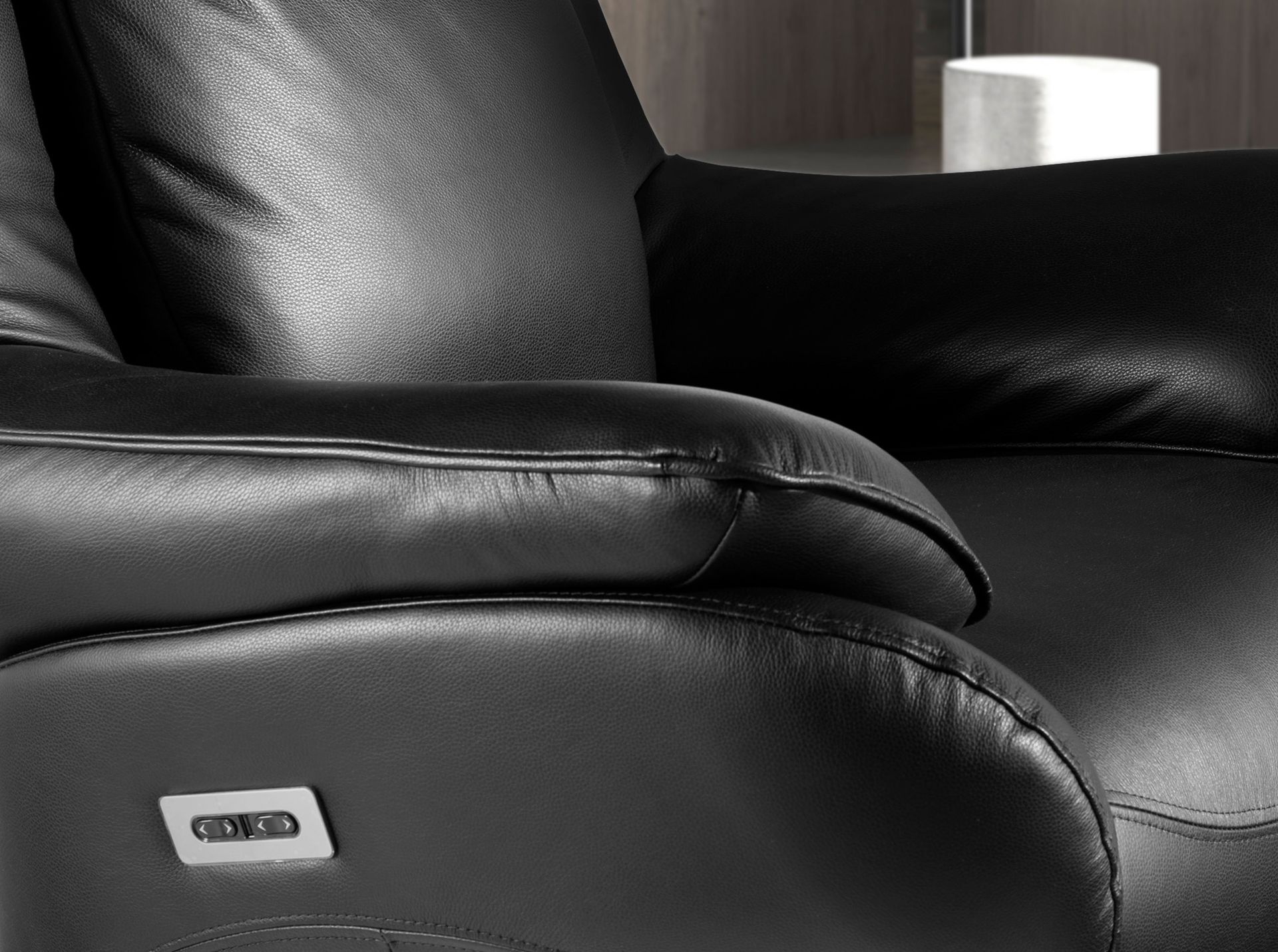 Black leather swivel armchair