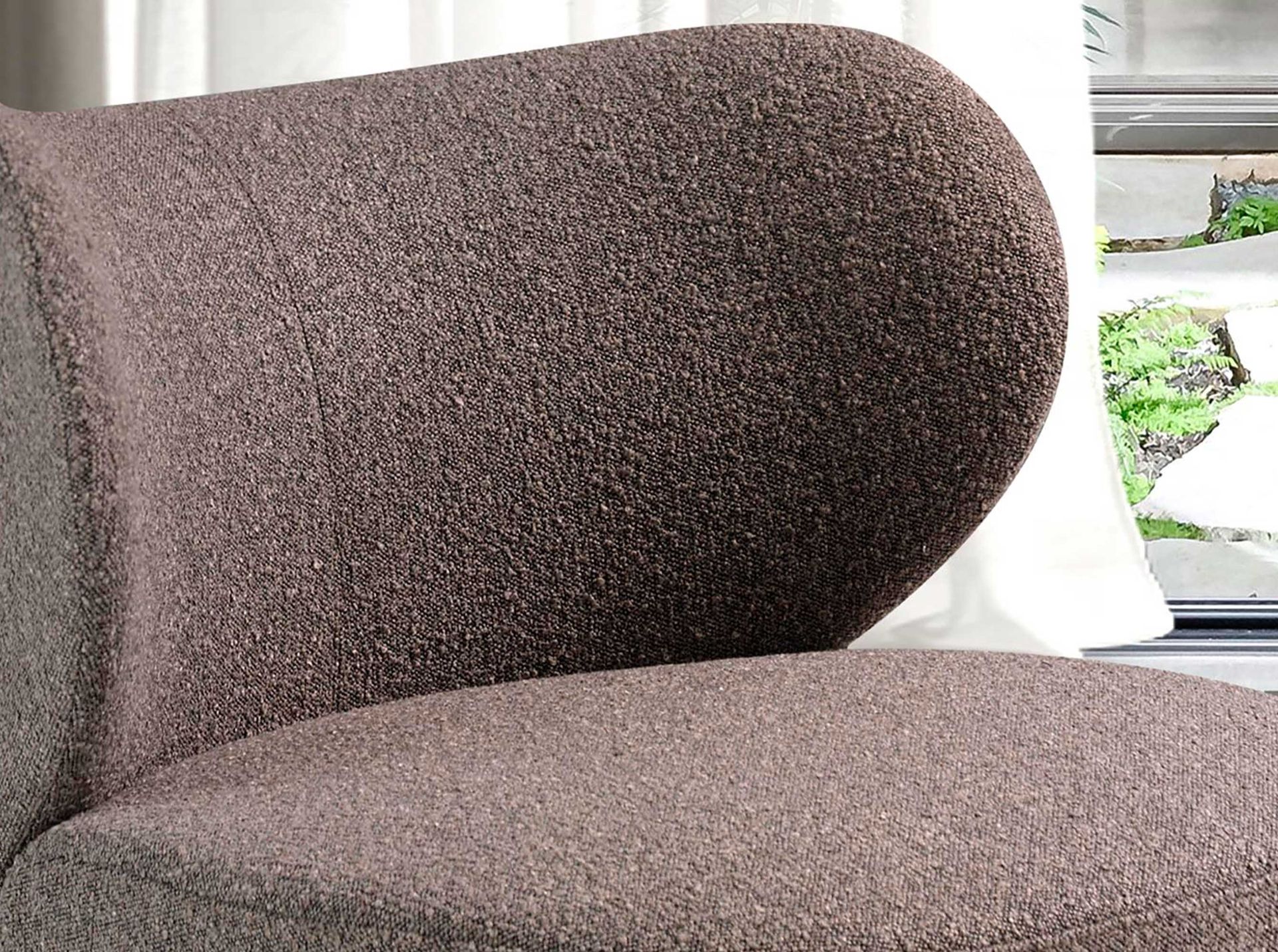 Brown fabric armchair