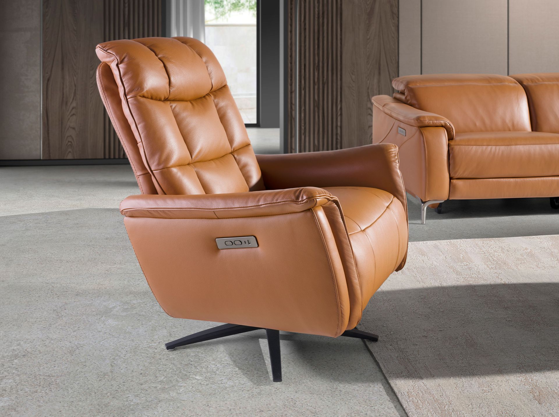 Brown leather swivel armchair