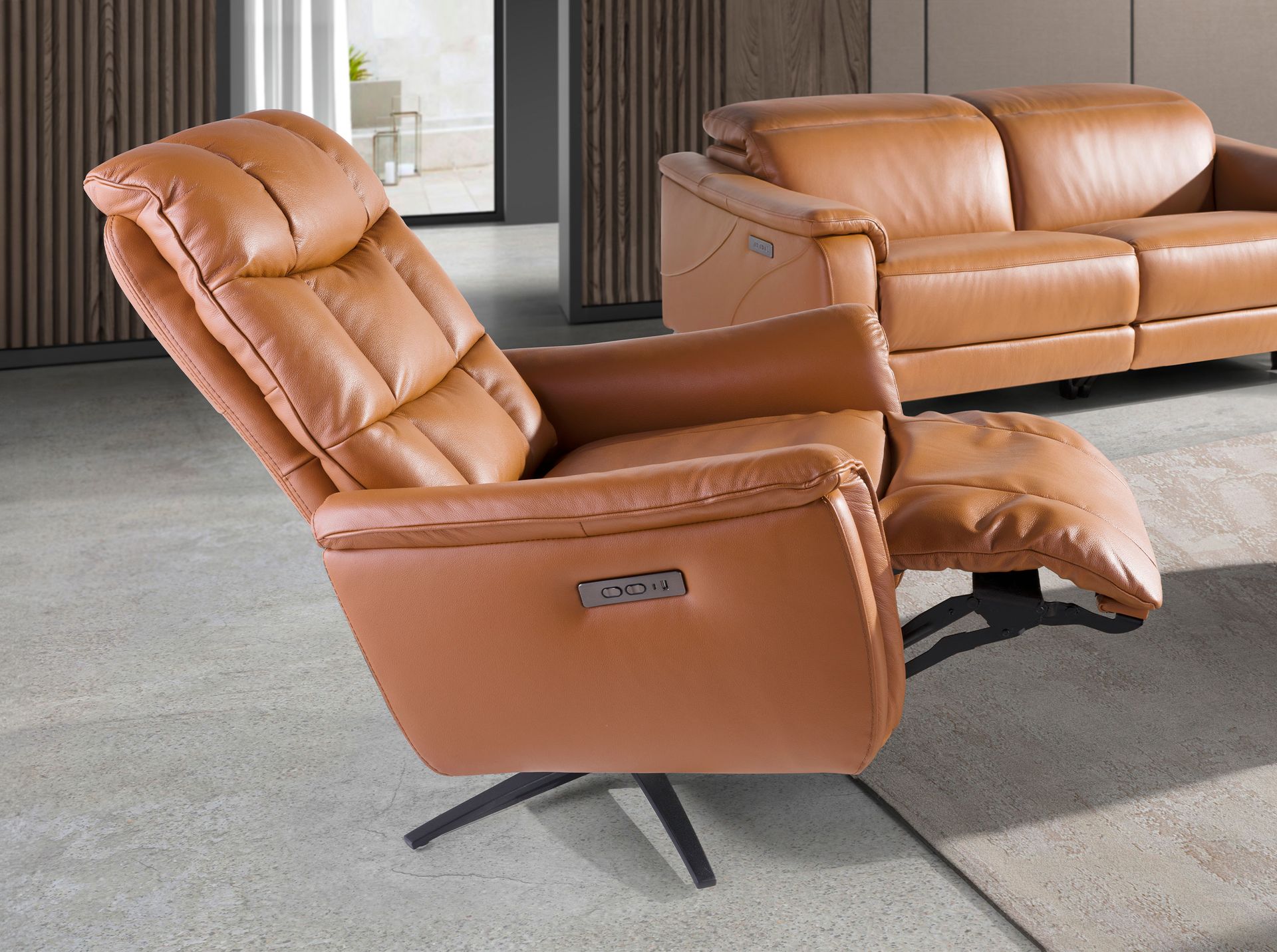 Brown leather swivel armchair