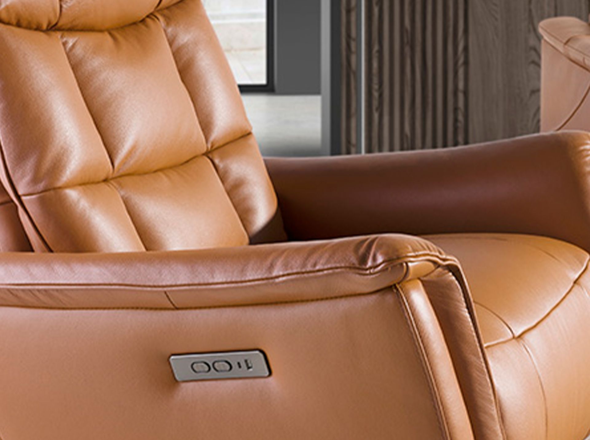 Brown leather swivel armchair