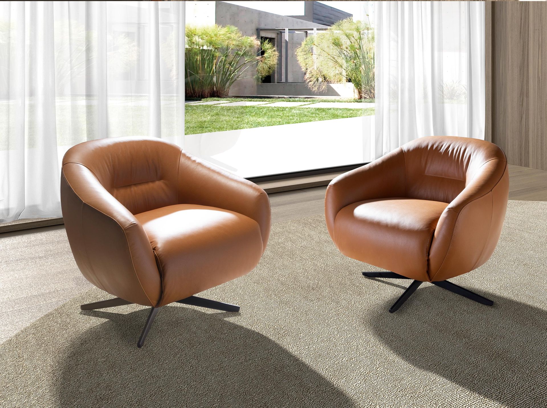 Brown leather swivel armchair