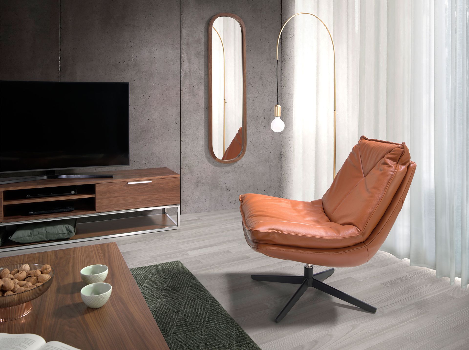 Brown leather swivel armchair