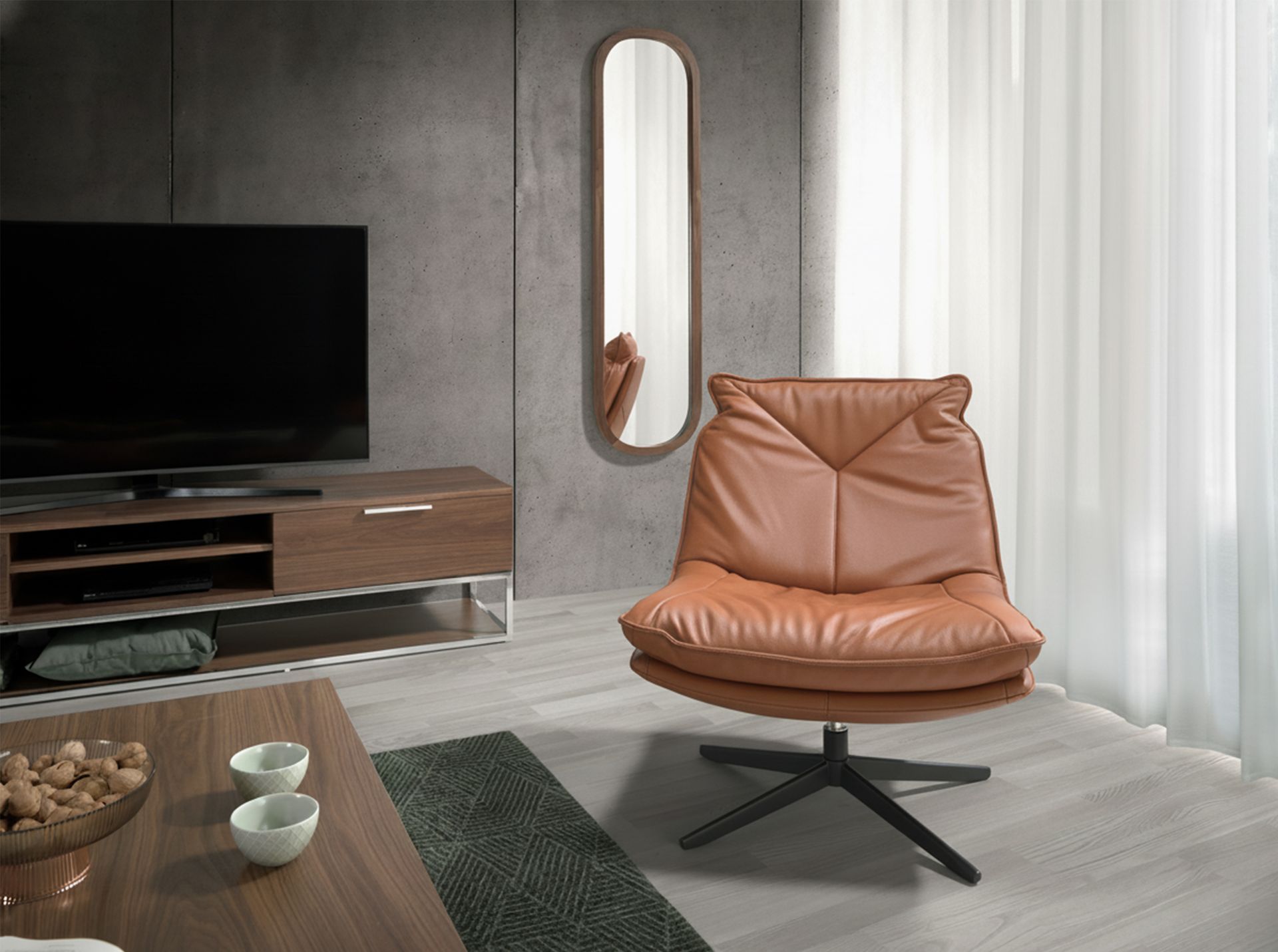 Brown leather swivel armchair