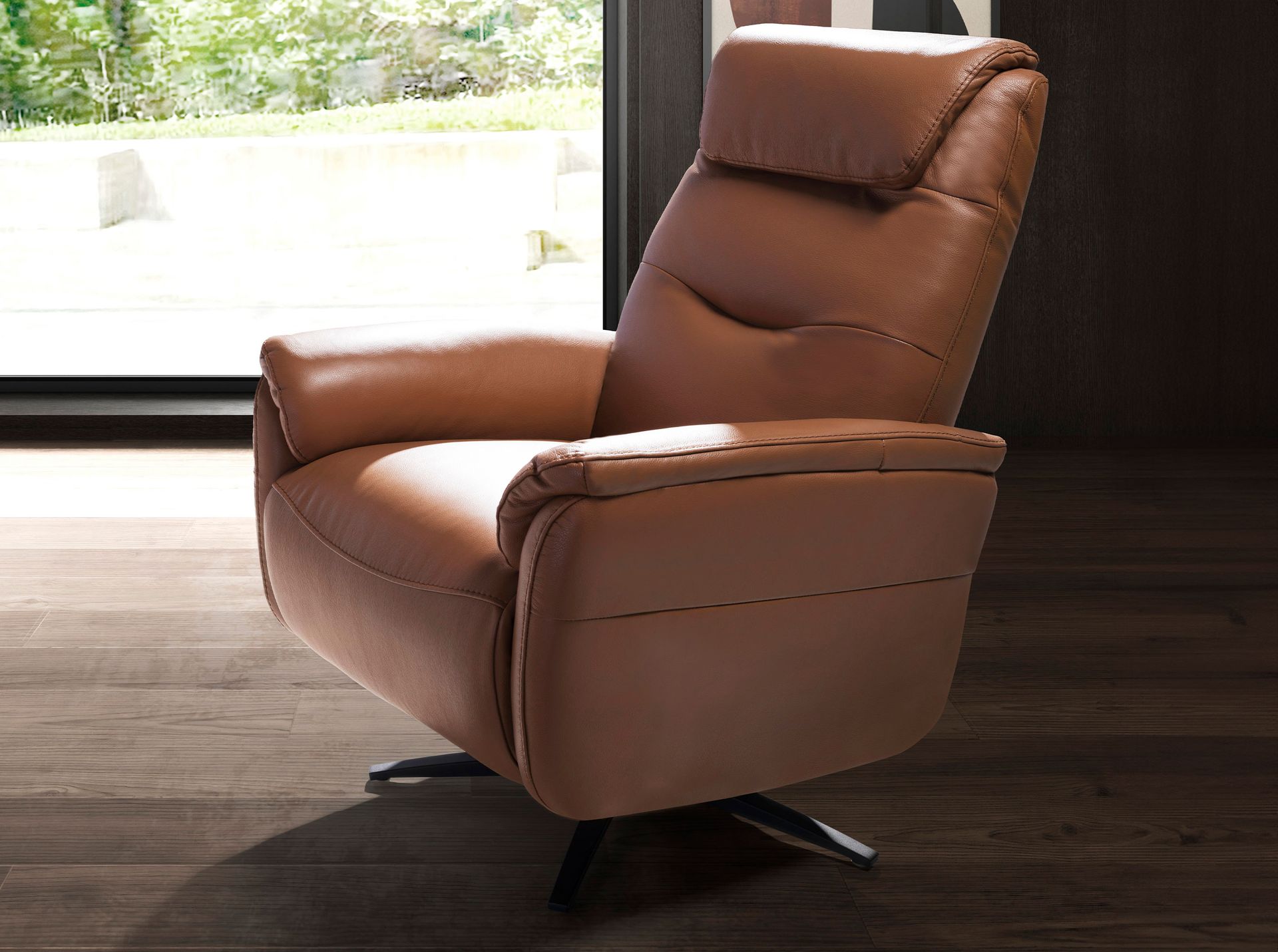Brown leather swivel armchair