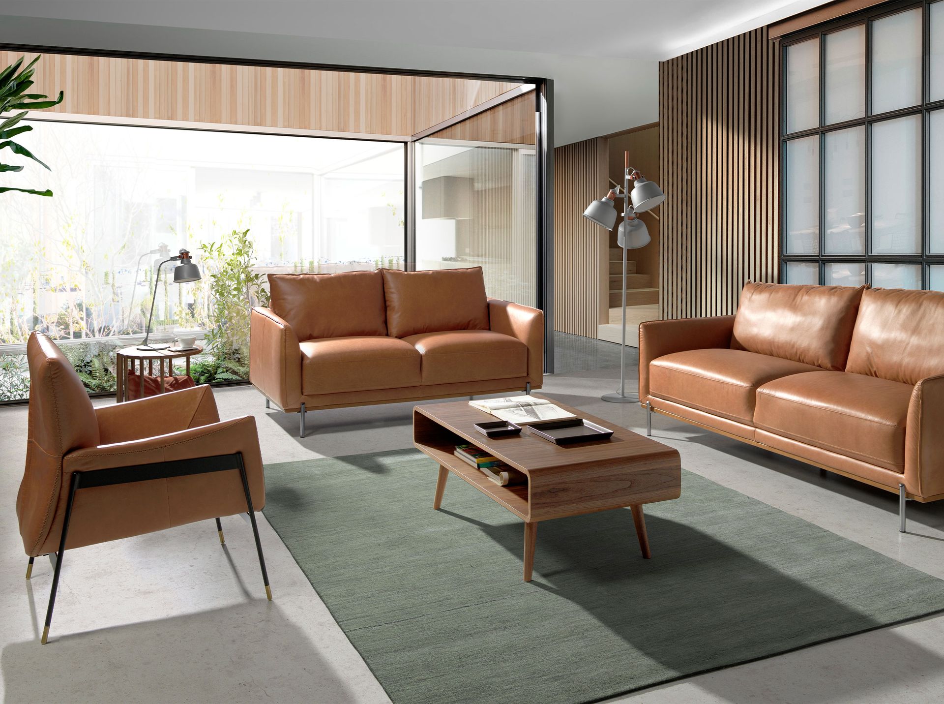 Brown leather swivel armchair