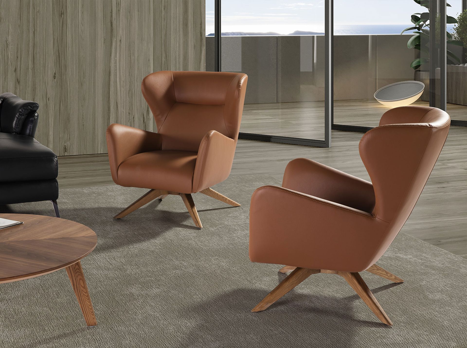 Brown leatherette swivel armchair