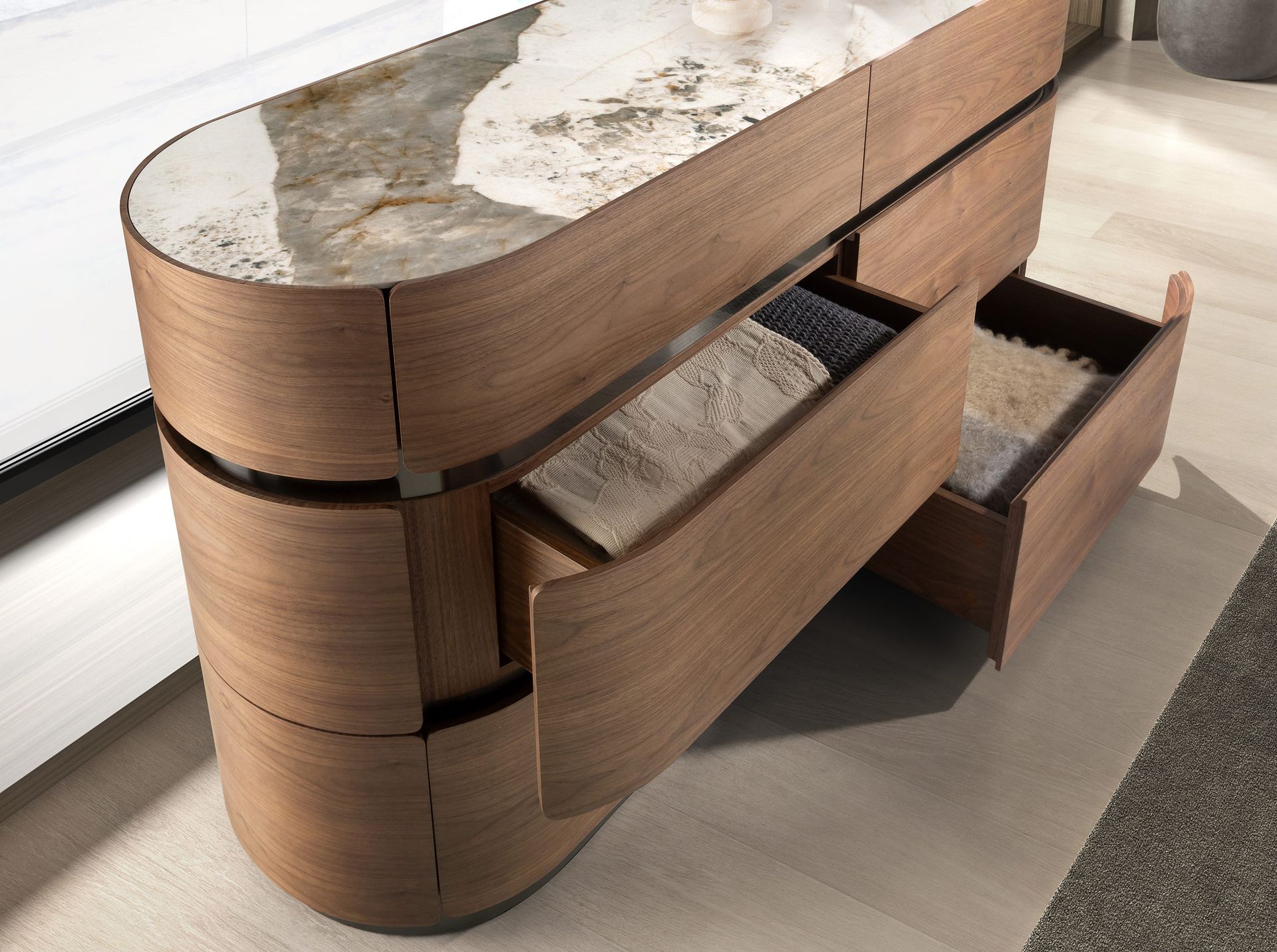 Chest of drawers in walnut, darkened steel base and porcelain marble top