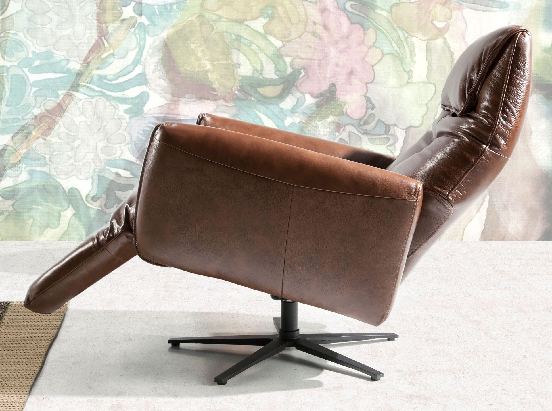 Chocolate brown leather swivel armchair
