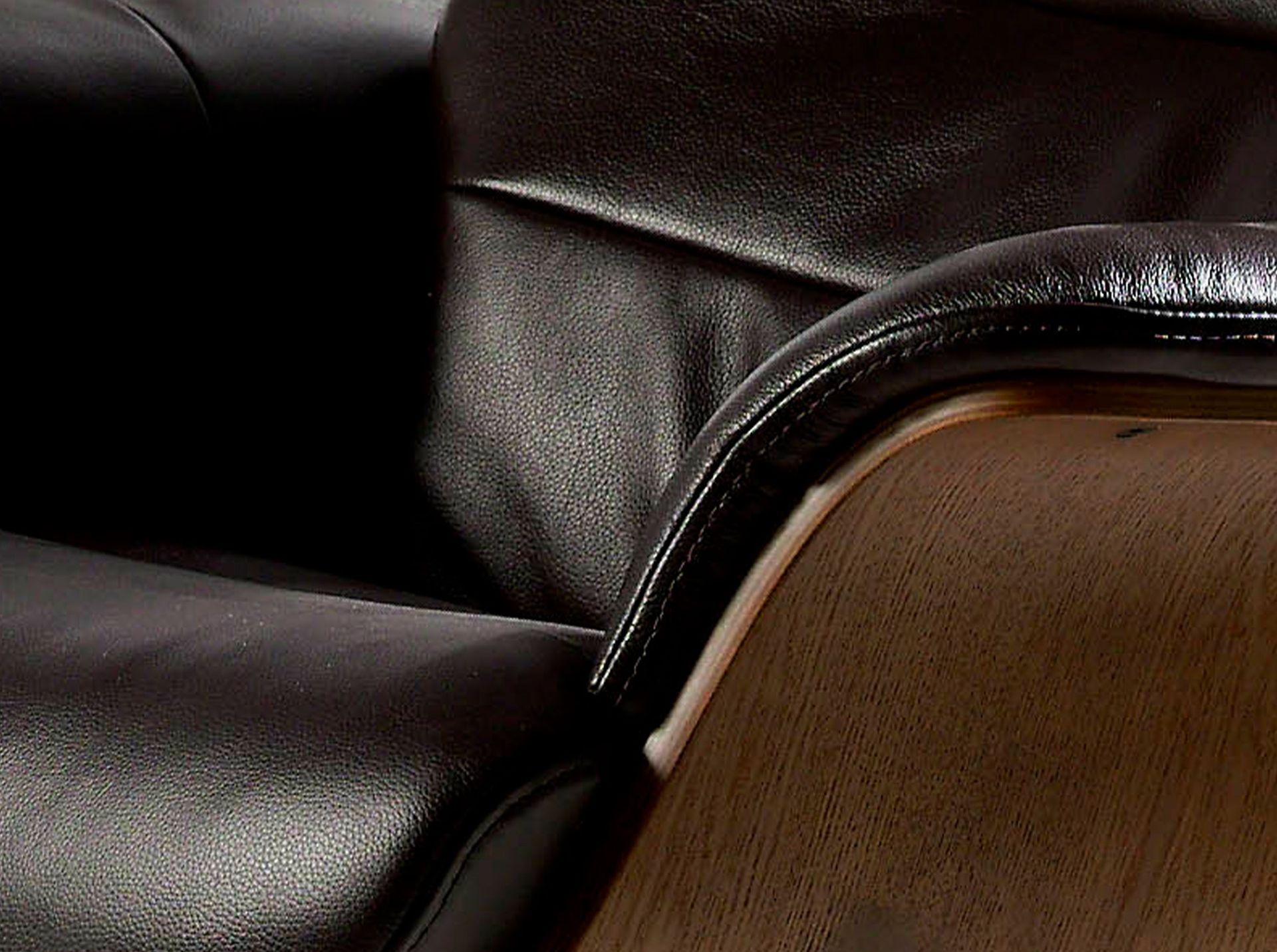 Chocolate brown leather swivel recliner armchair