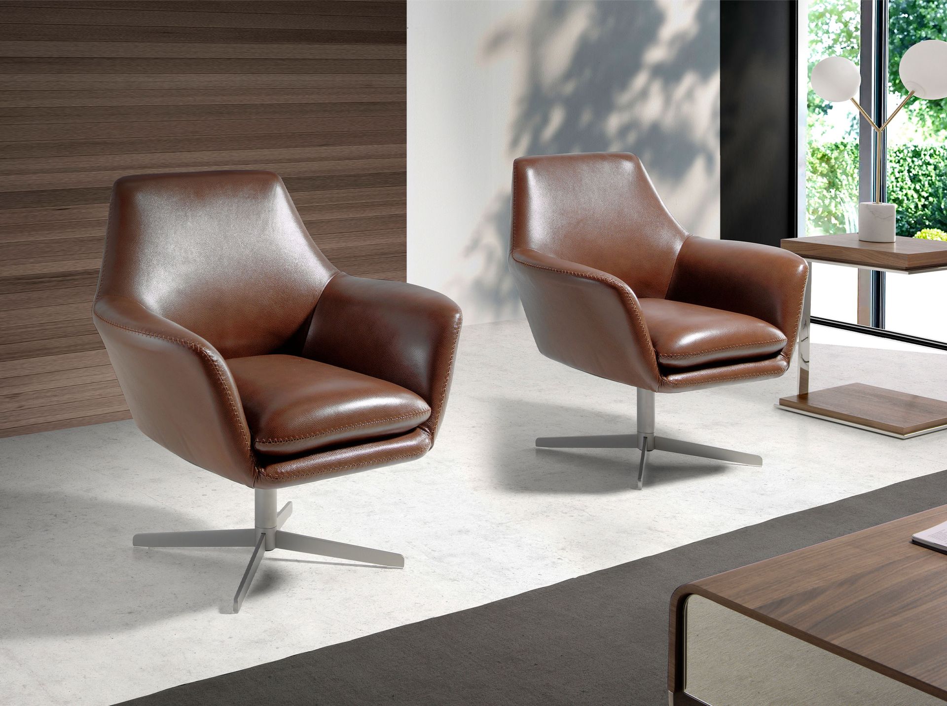 Cognac brown leather swivel armchair