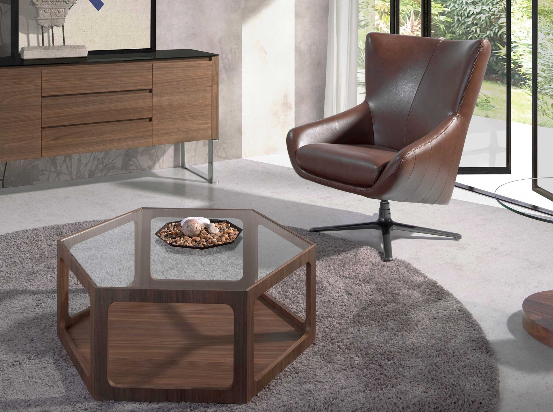 Cognac brown leather swivel armchair