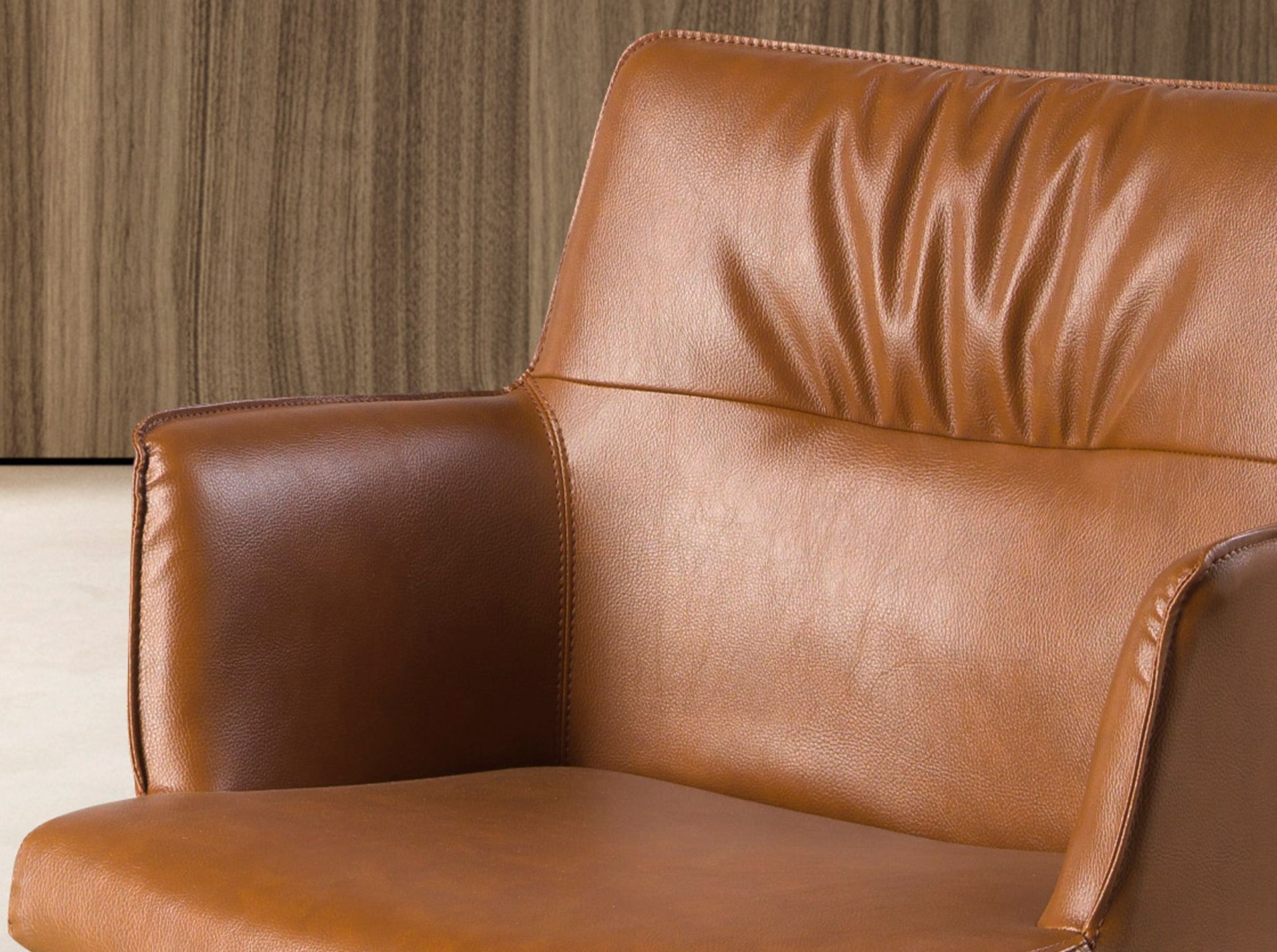 Cognac brown leatherette swivel chair