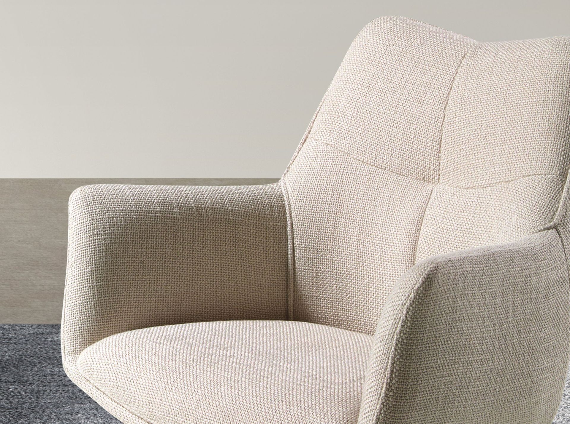 Cream fabric swivel chair