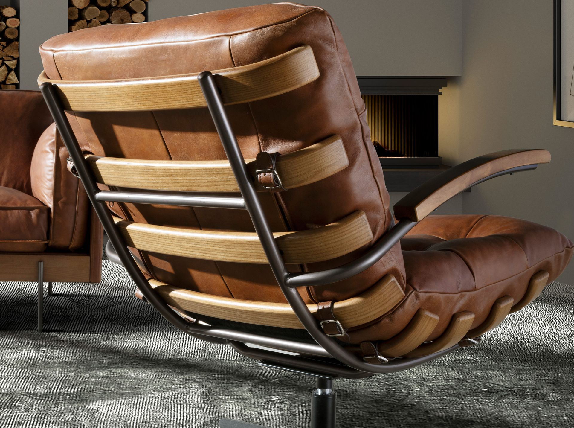 Dark brown leather and walnut swivel armchair
