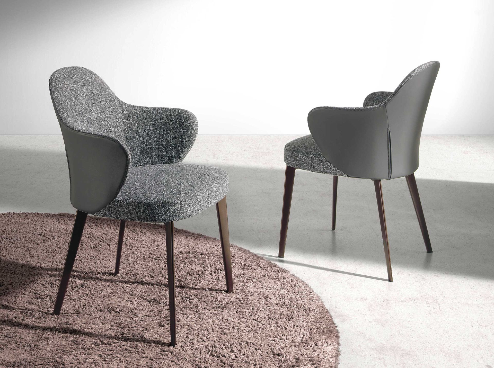 Dark grey fabric and leatherette chair