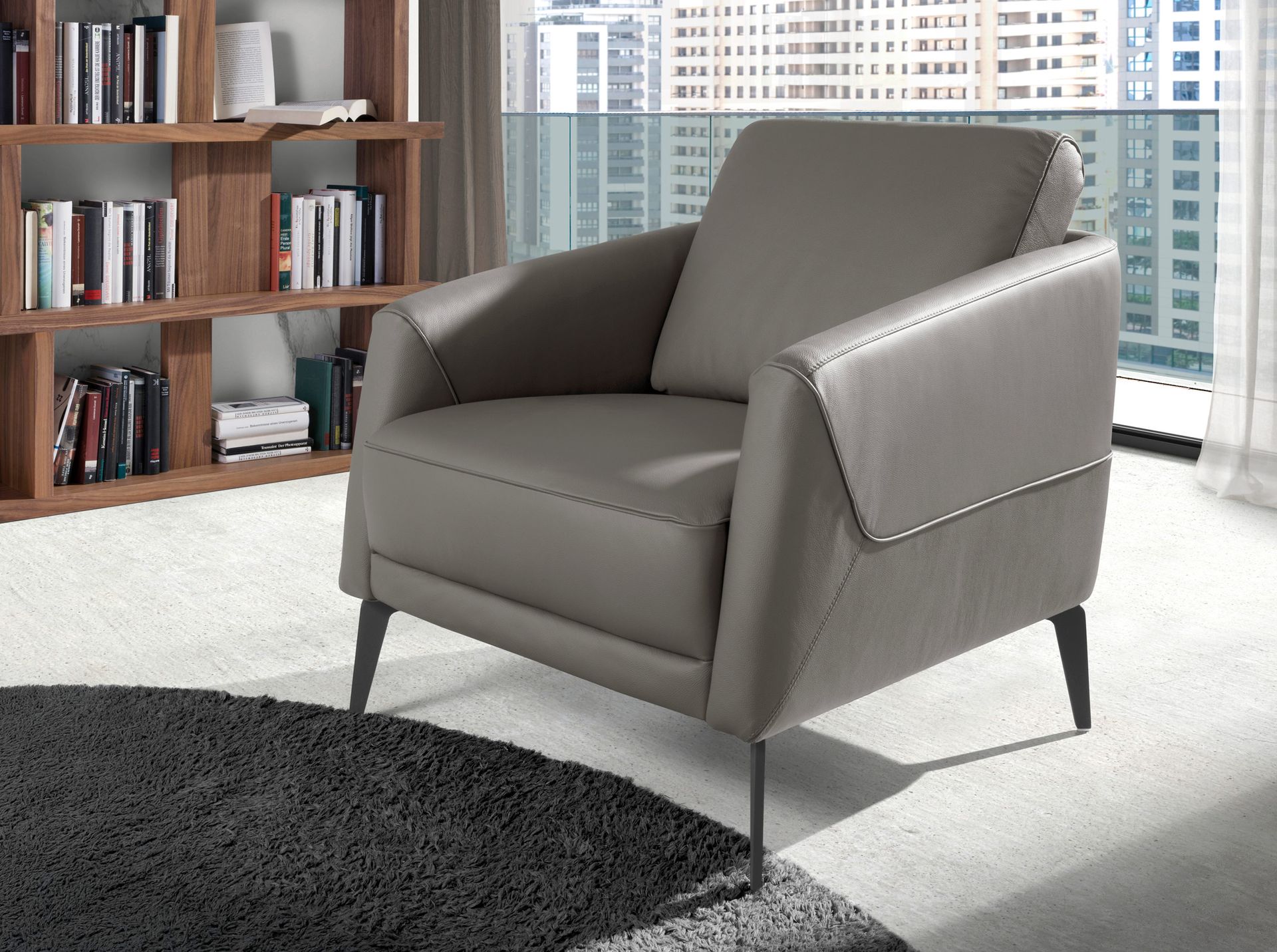 Dark grey leather armchair
