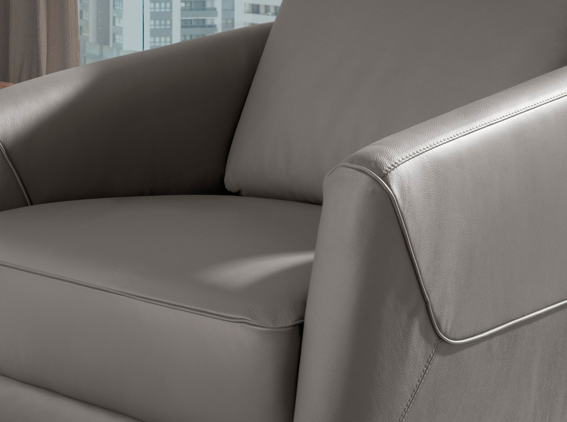 Dark grey leather armchair