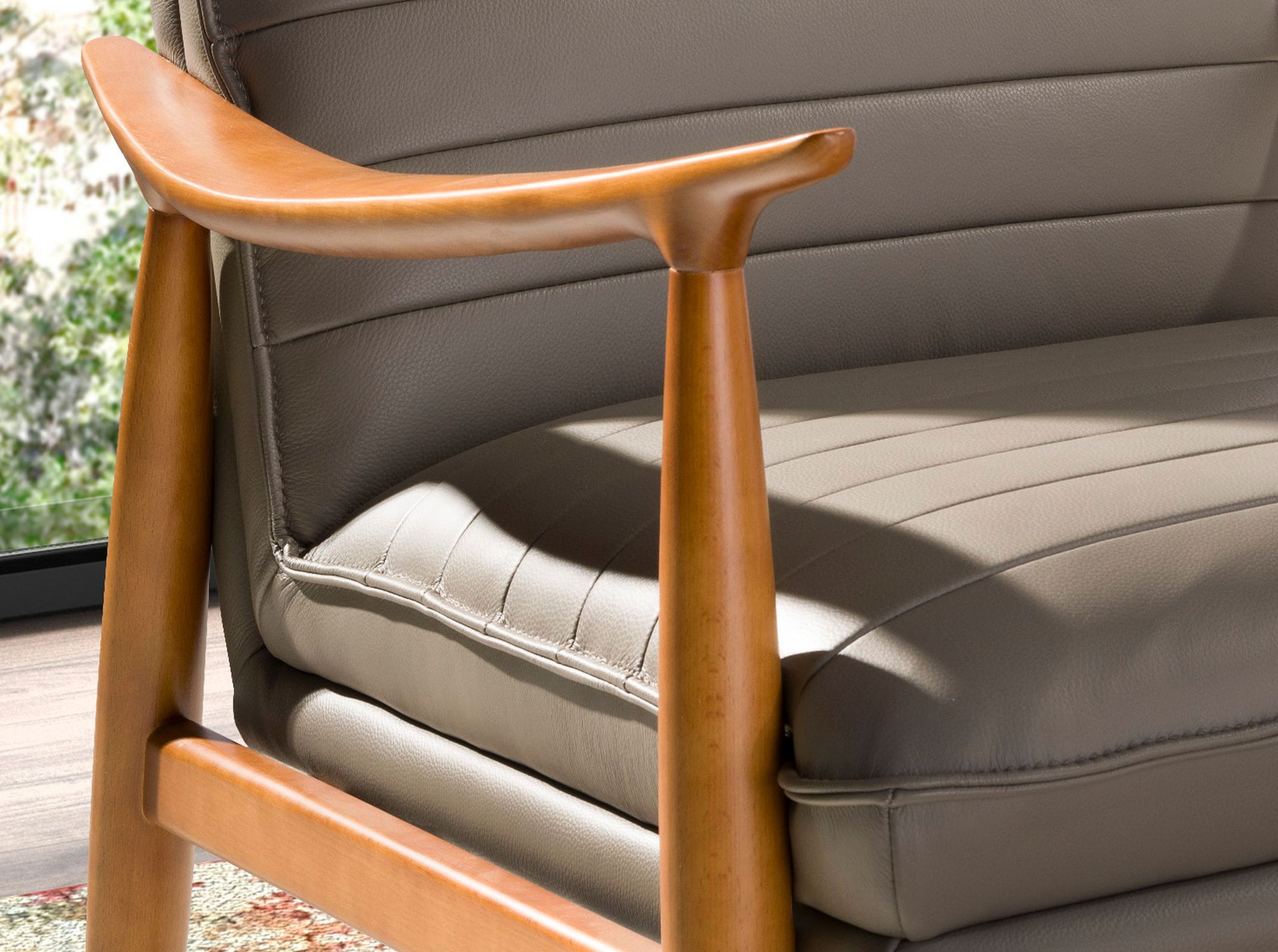 Dark grey leather armchair