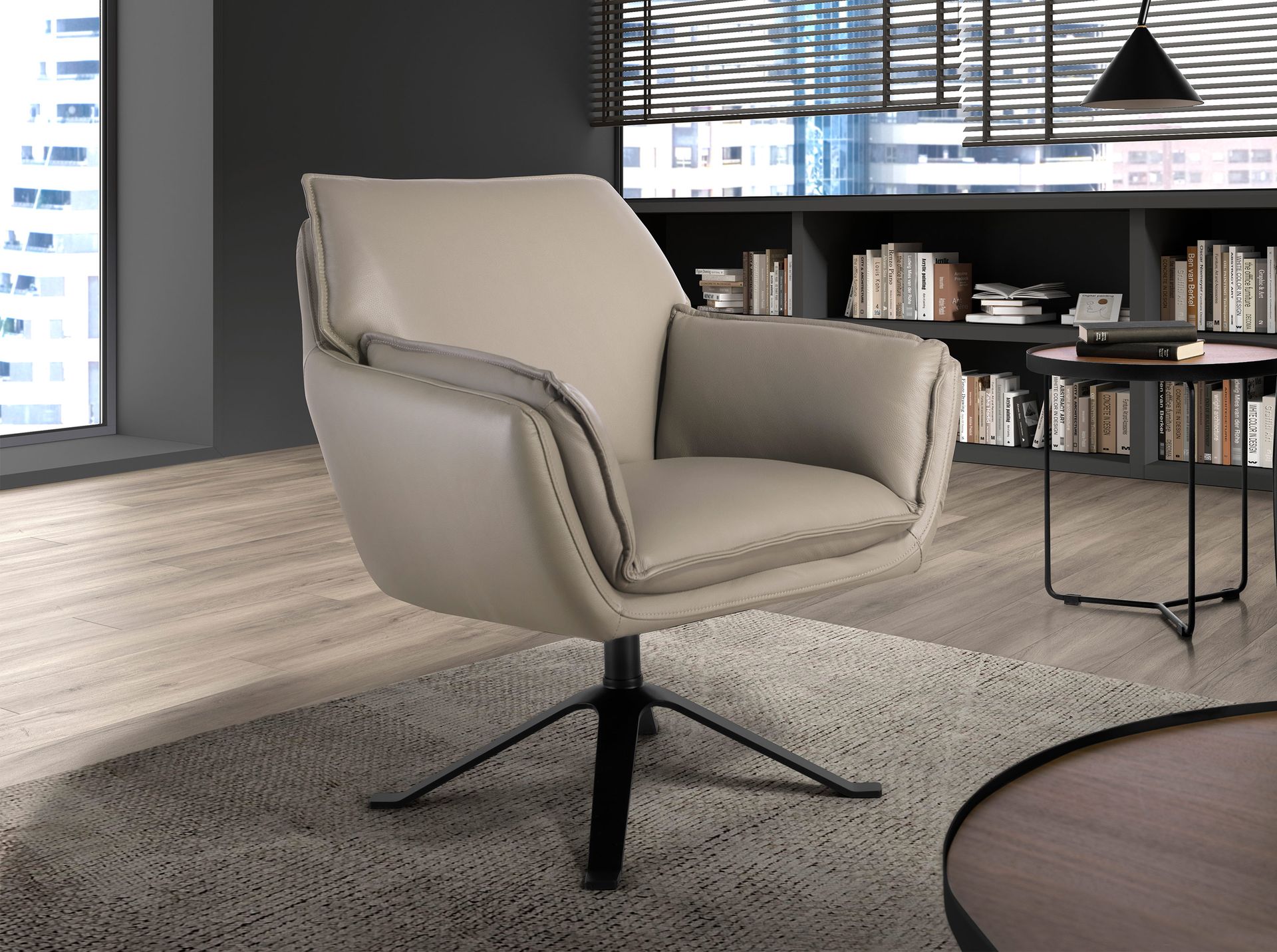 Dark grey leather swivel armchair