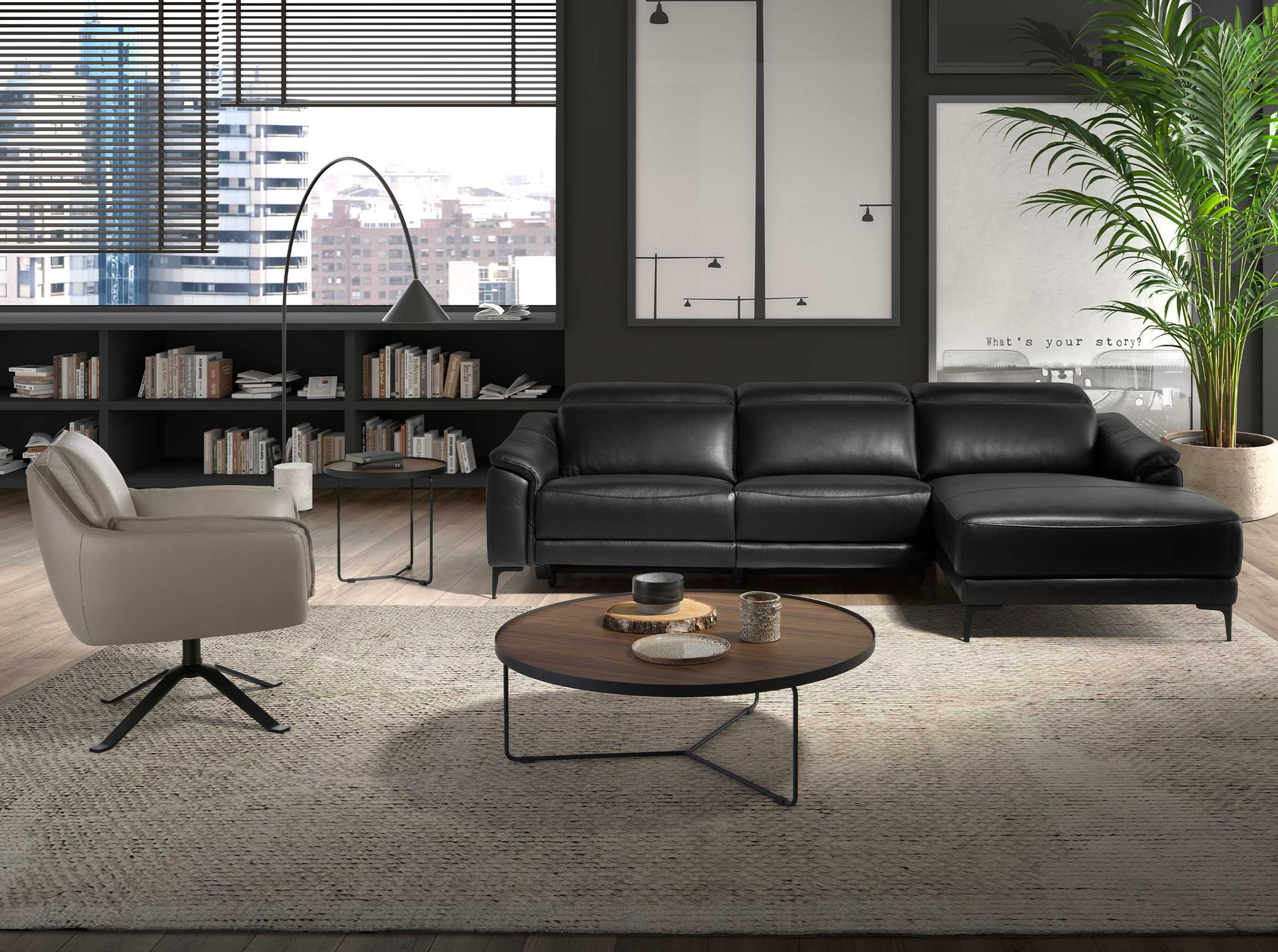 Dark grey leather swivel armchair