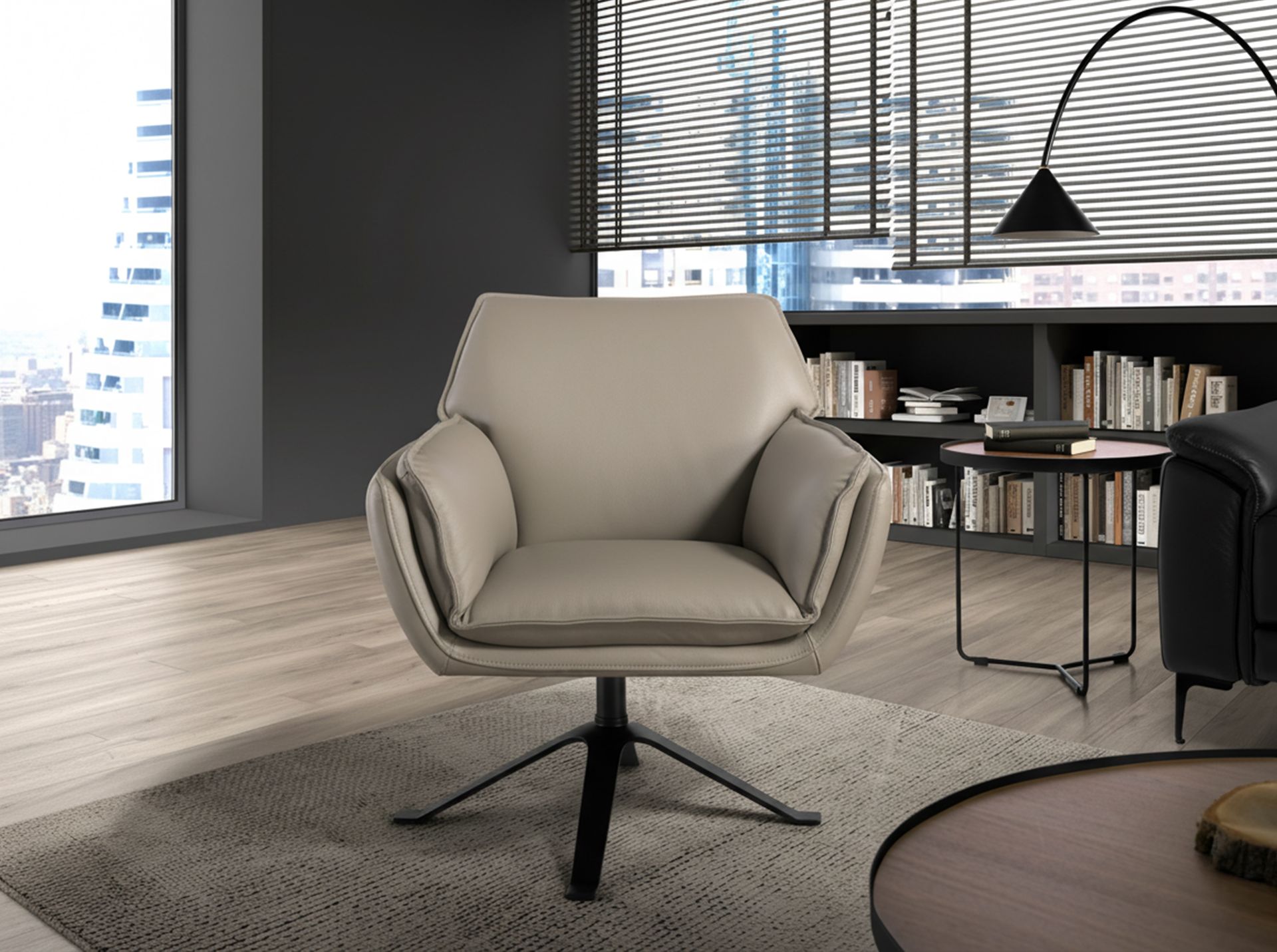 Dark grey leather swivel armchair