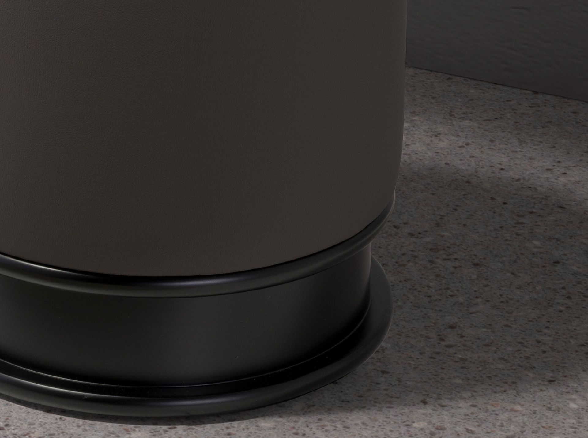 Dark grey leatherette pouffe