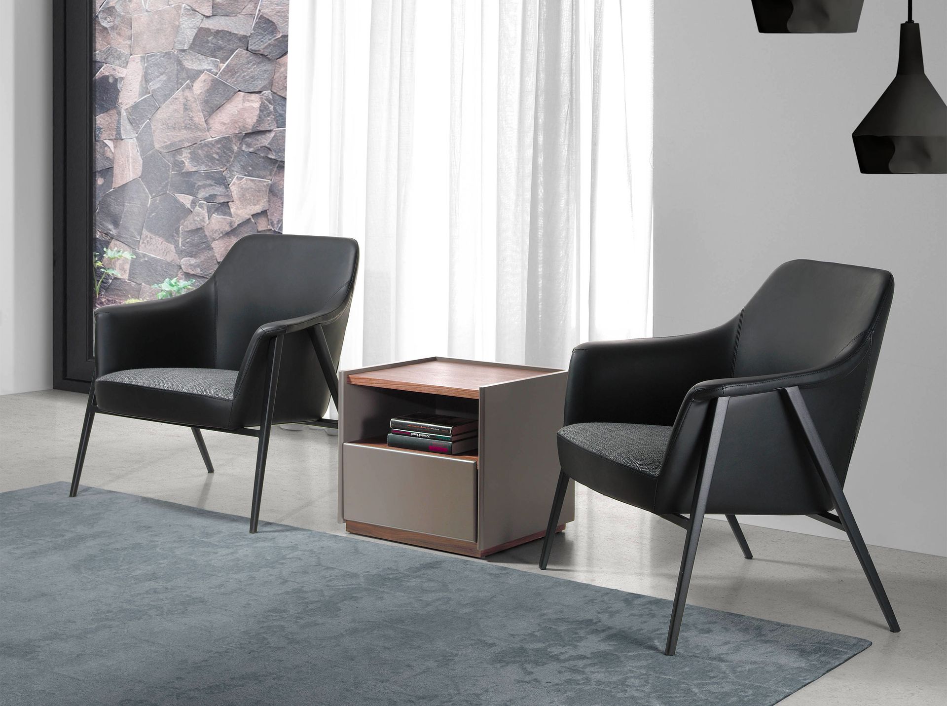 Grey fabric and black leatherette swivel armchair