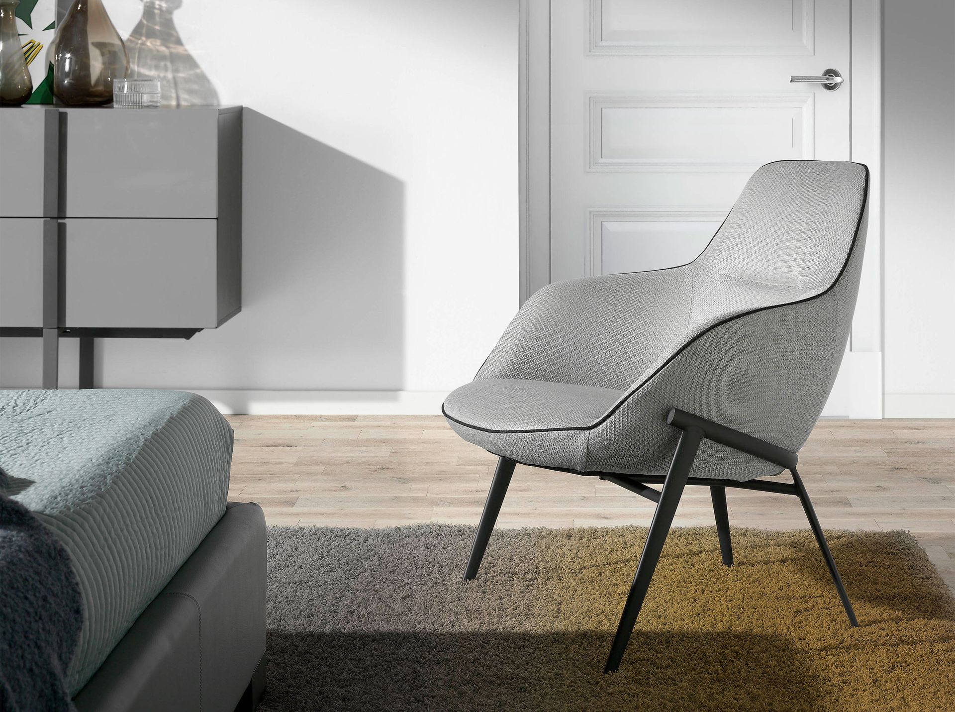 Grey fabric armchair