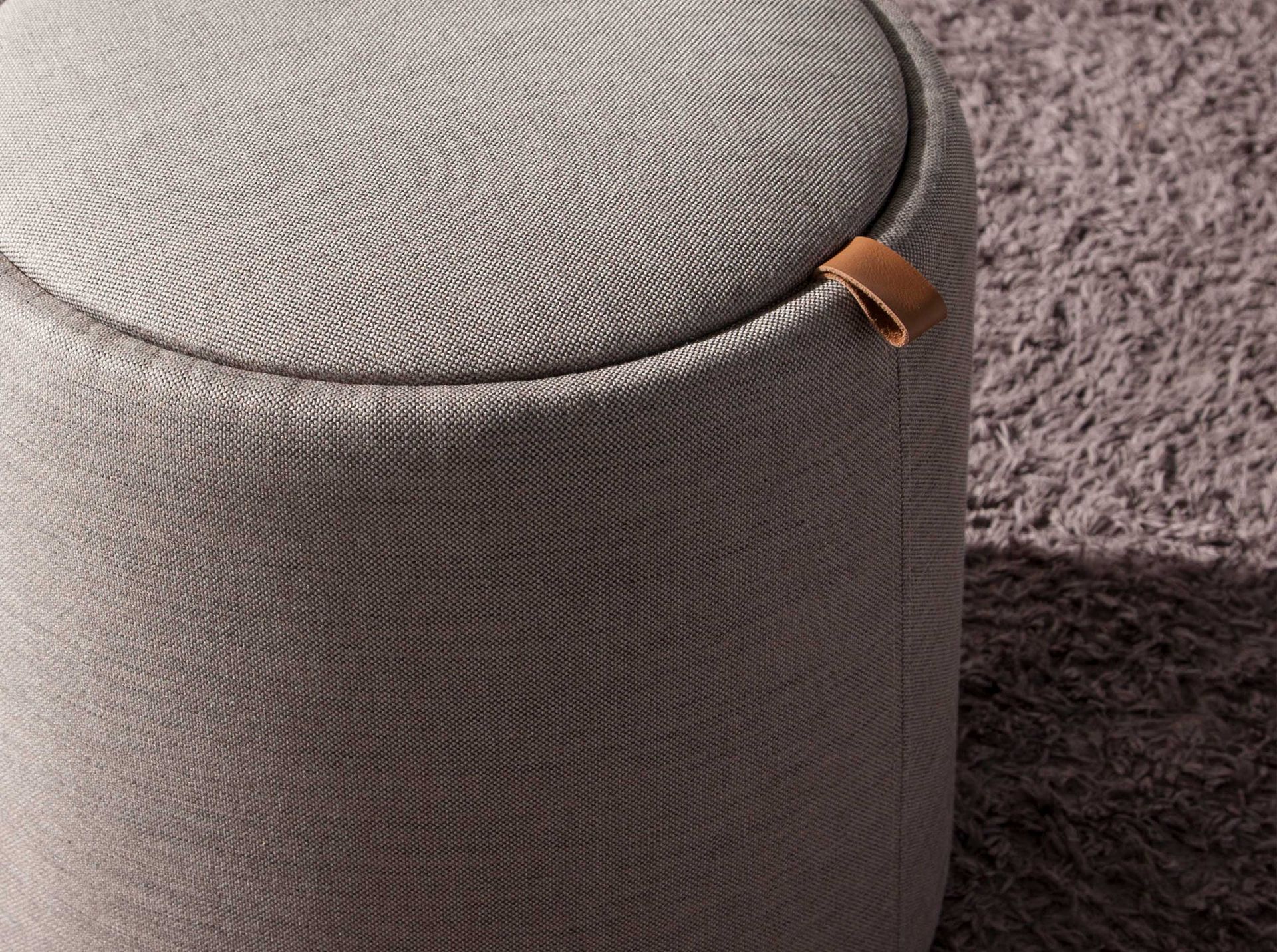 Grey fabric pouffe