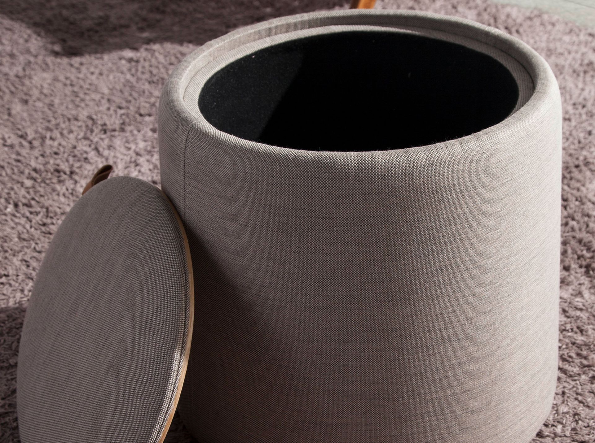 Grey fabric pouffe