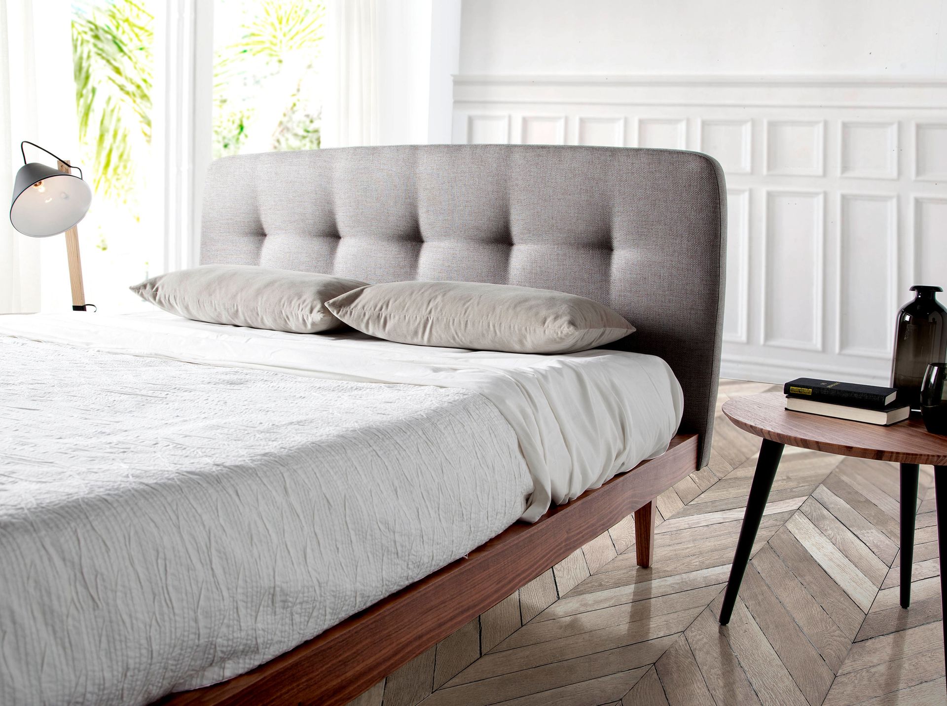 Grey fabric tufted bed