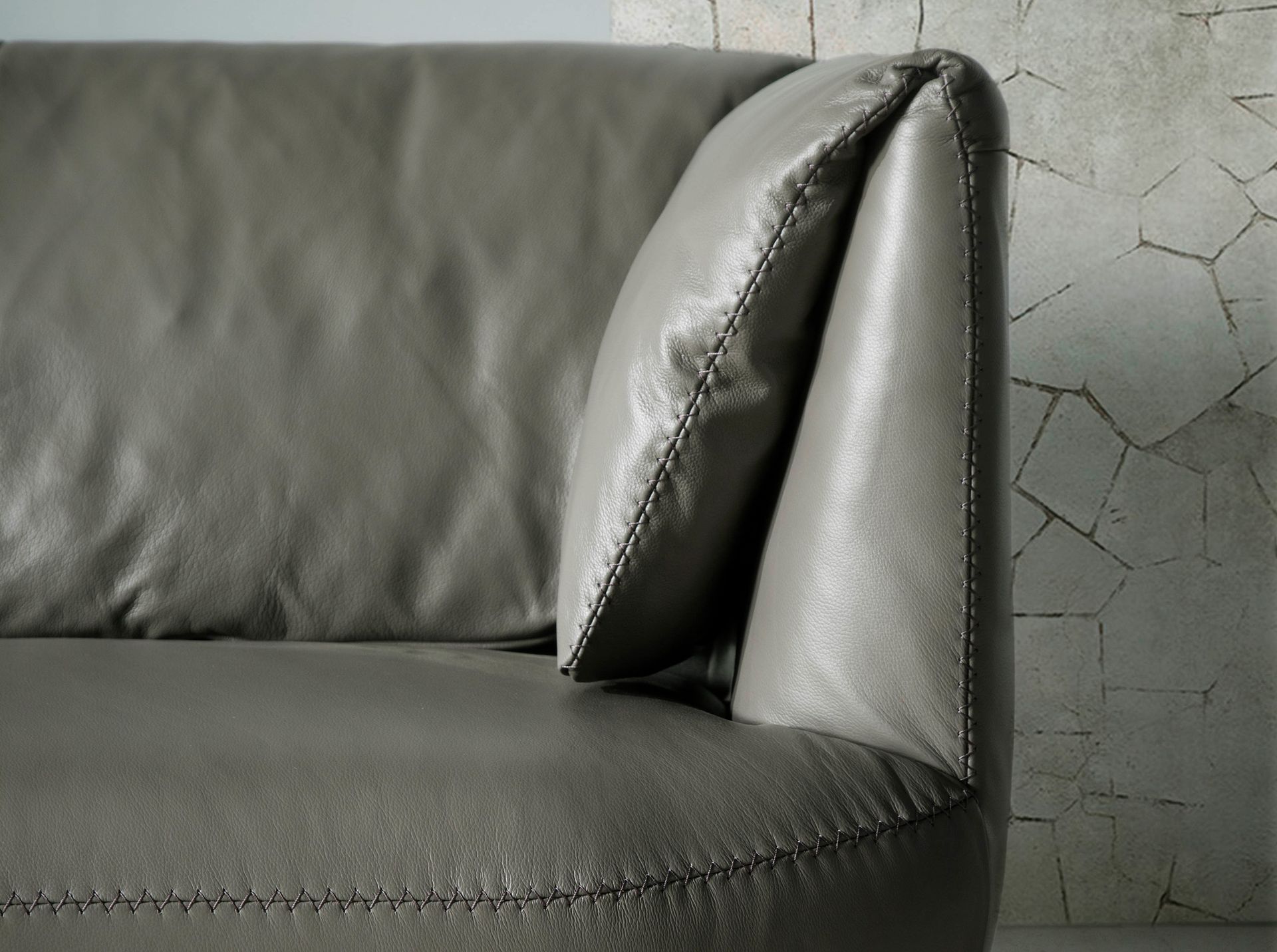 Grey leather 2 seater sofa
