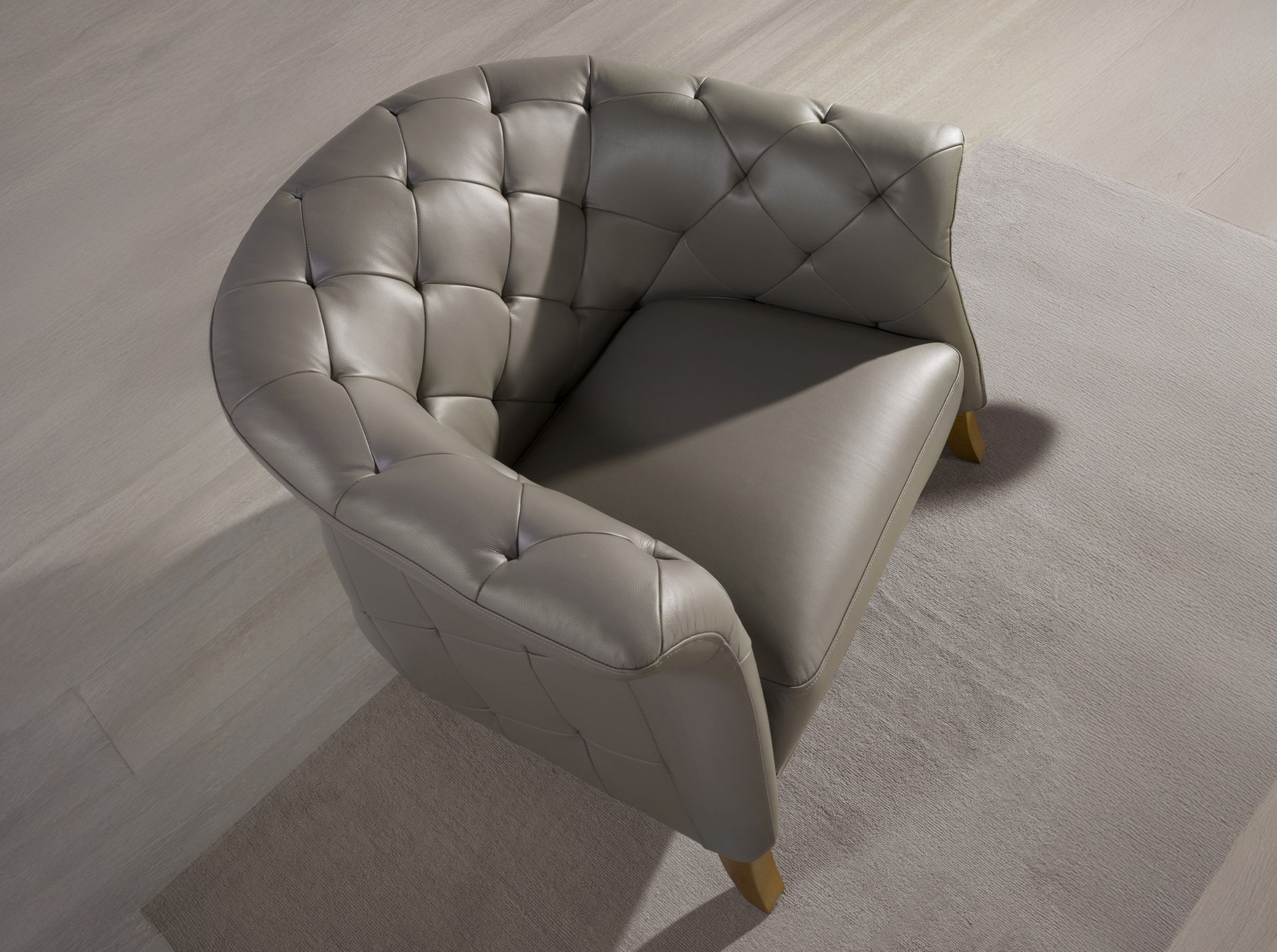 Grey leather armchair