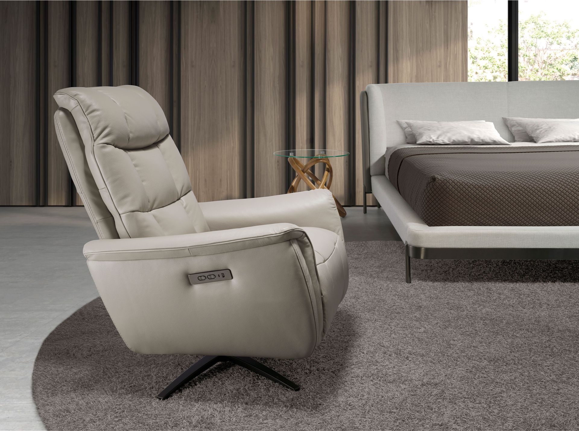 Grey leather swivel armchair