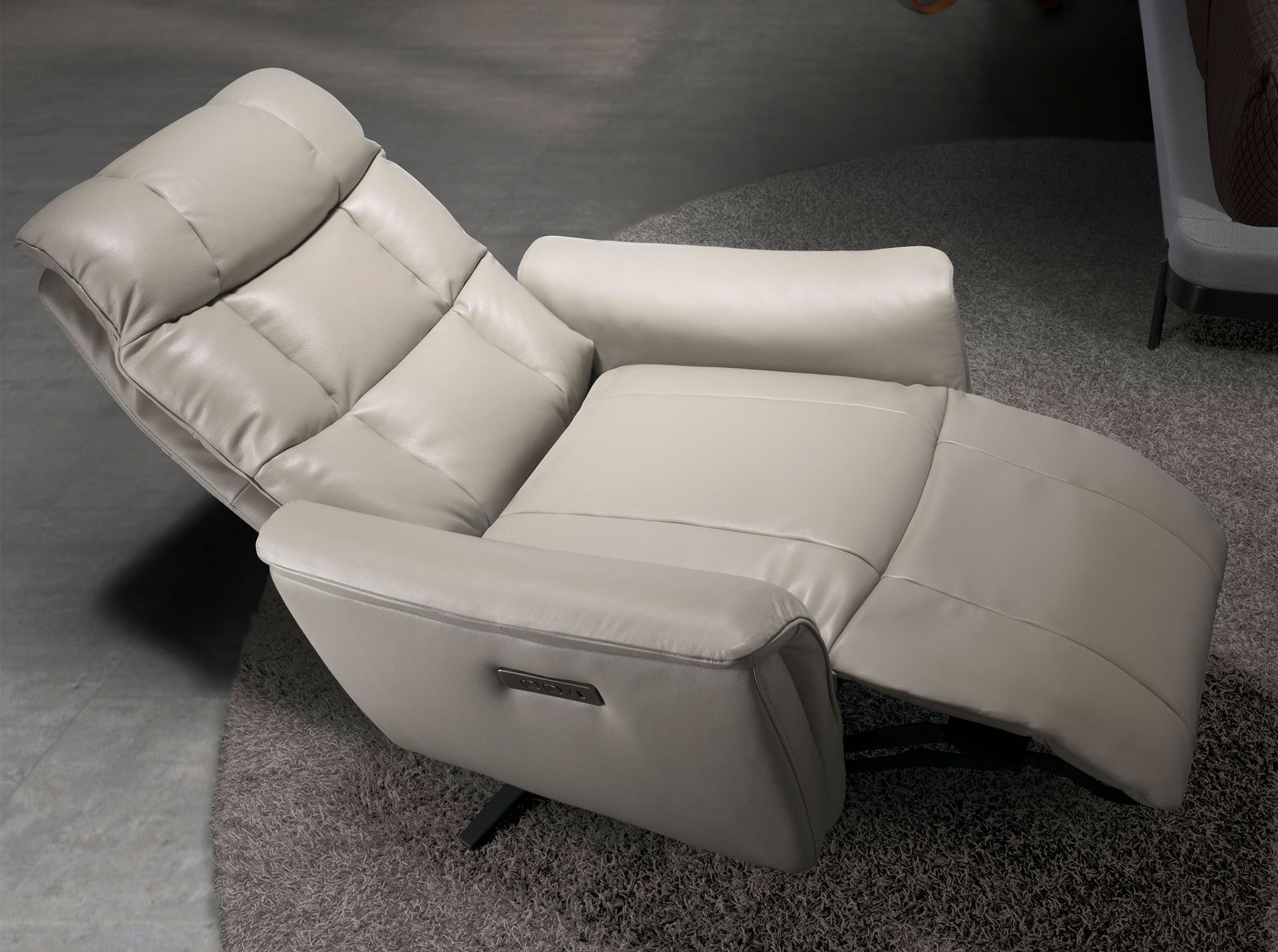 Grey leather swivel armchair