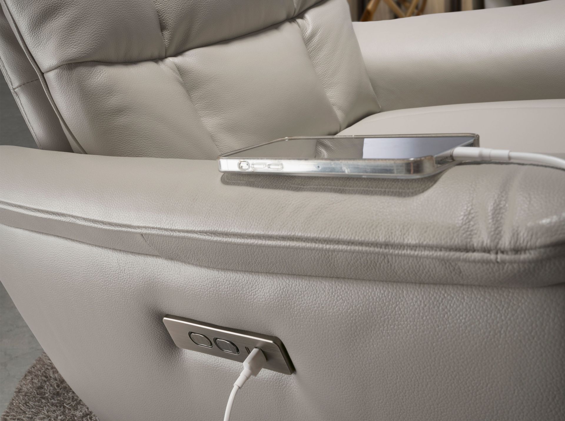 Grey leather swivel armchair