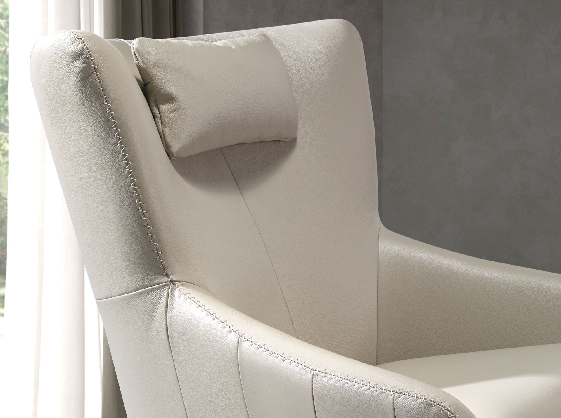 Grey taupe leather swivel armchair