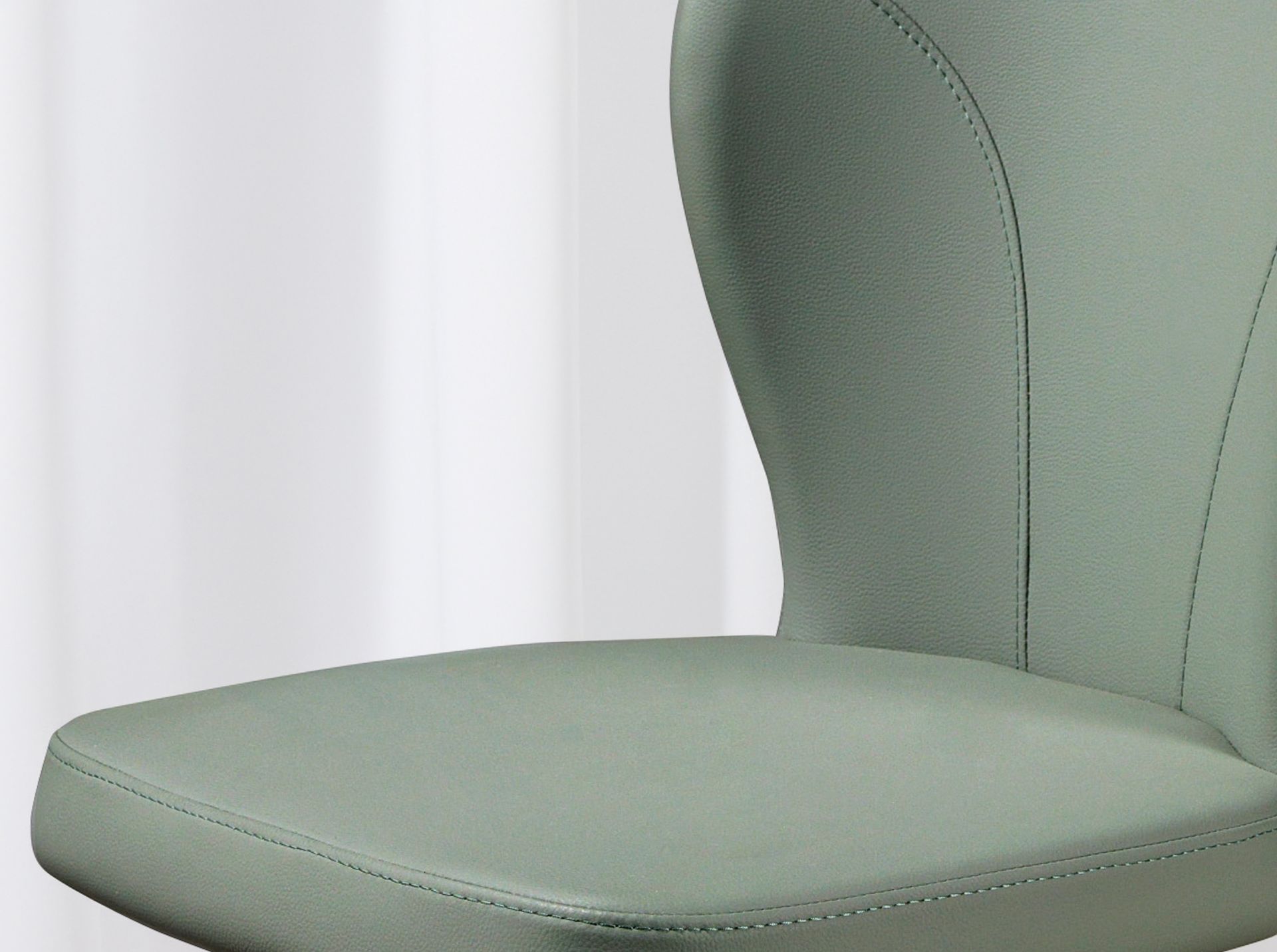 Light green leatherette swivel chair
