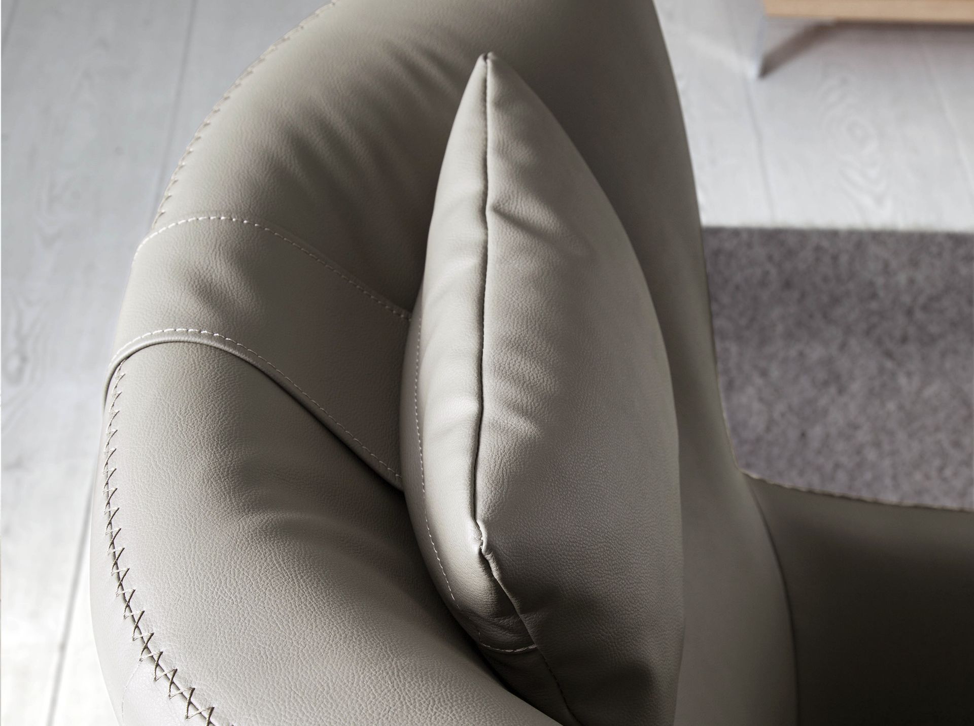 Mink leatherette swivel armchair