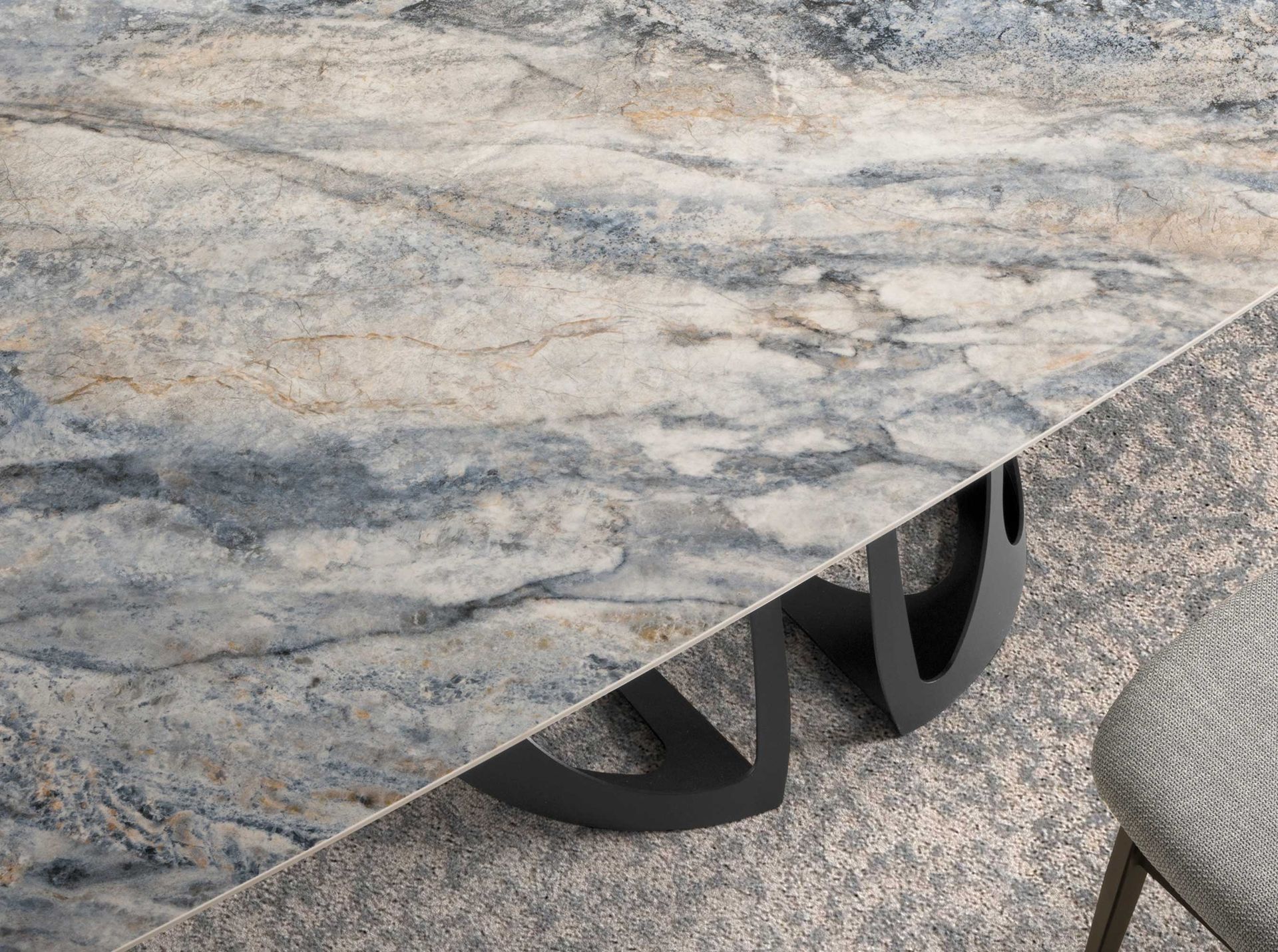 Oval Barrel porcelain marble and black steel dining table