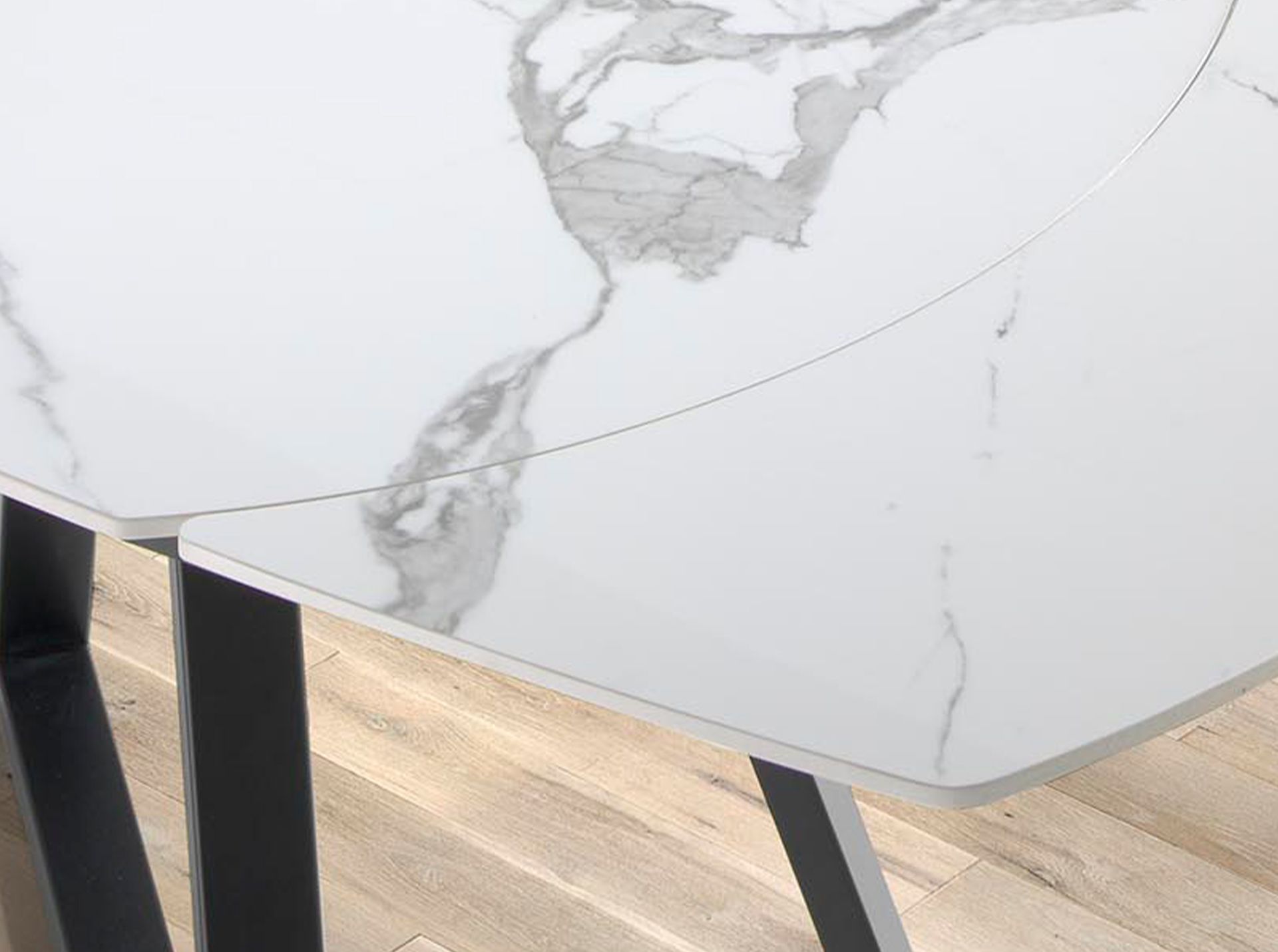 Oval Barrel porcelain marble and black steel extending dining table