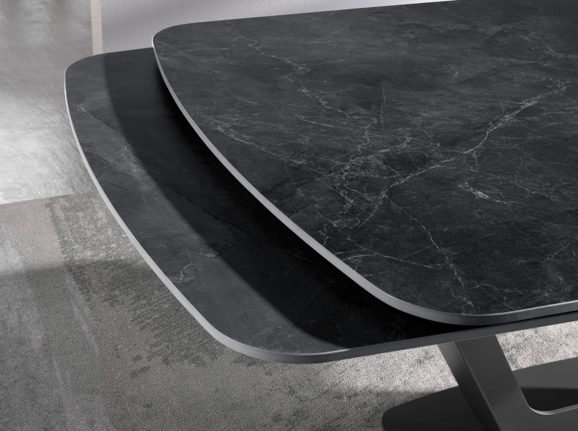 Oval Barrel porcelain marble and black steel extending dining table