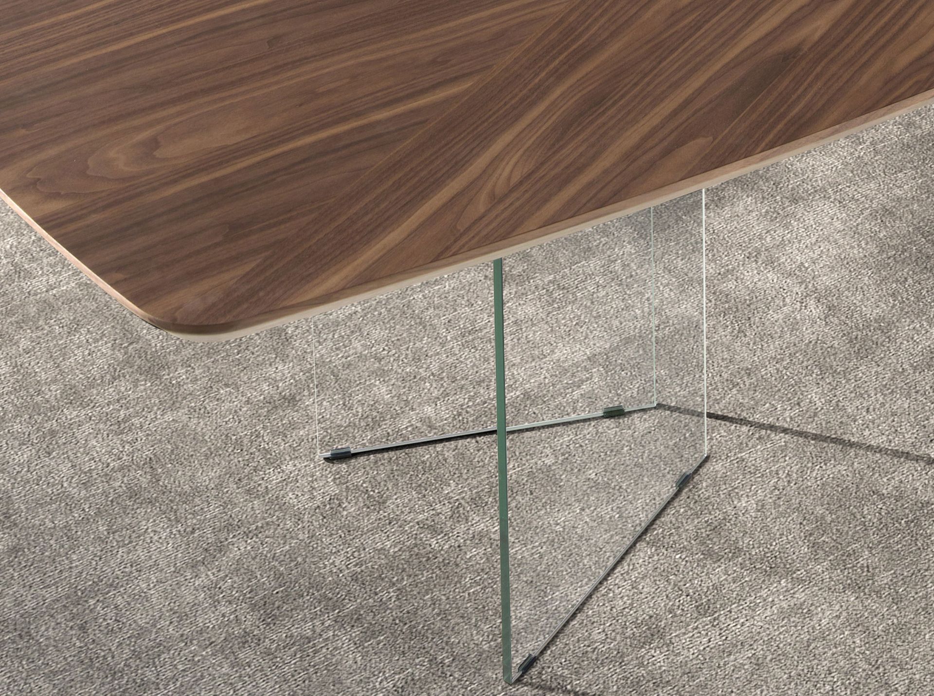Oval barrel dining table in walnut and tempered glass