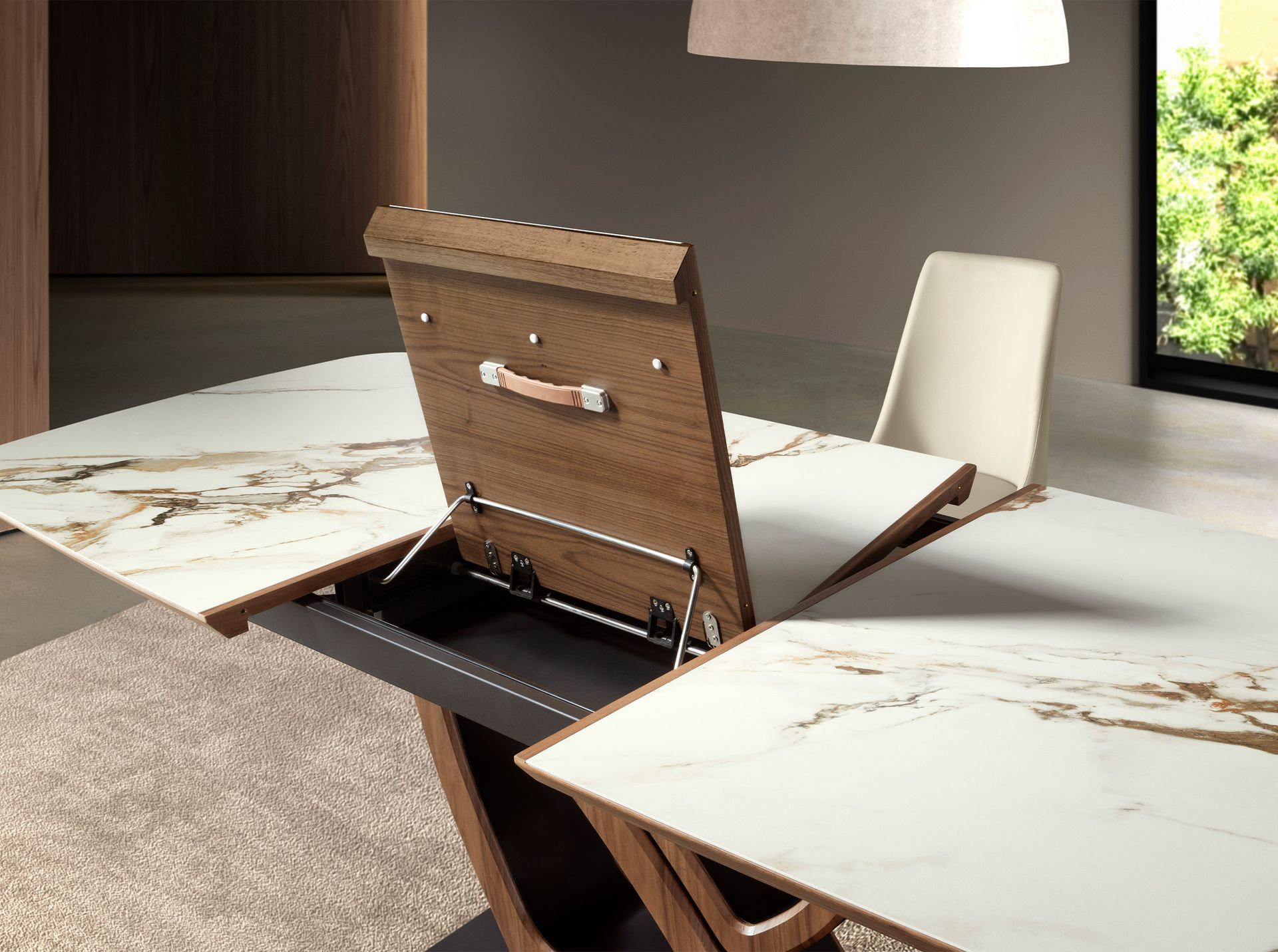 Oval extending dining table with porcelain marble and walnut barrel